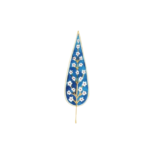 Close-up of a decorative pin in the shape of a blue leaf with white flowers and green accents, attached to a fabric surface.