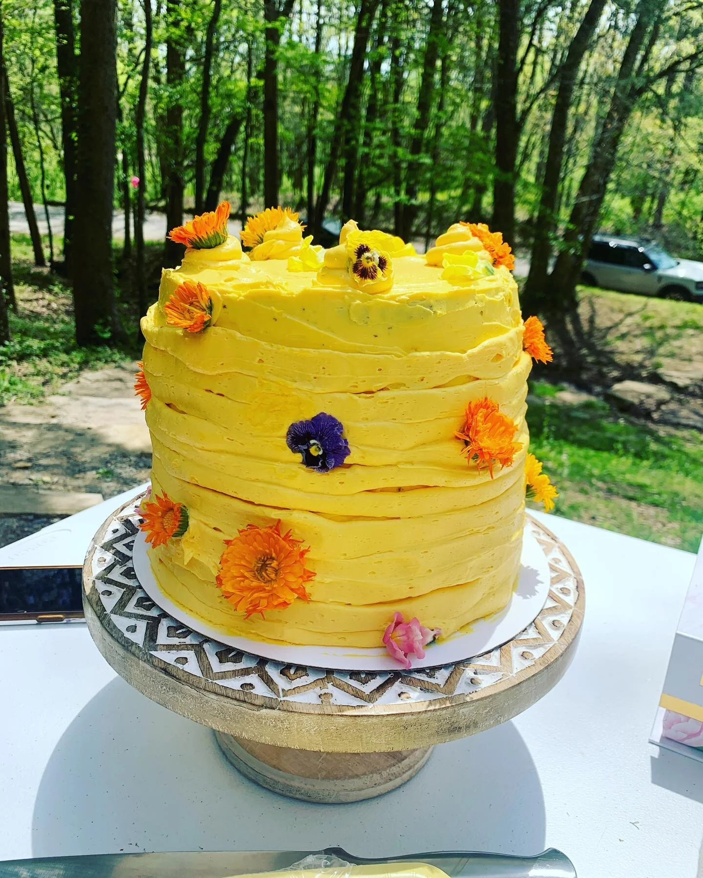 A little springtime vibrance in cake form, including a smash cake for a one year old cutie. 
This 8 layer cake is covered with white chocolate ganache buttercream. Inside is strawberry and fudge cake layered with cream cheese buttercream and strawber