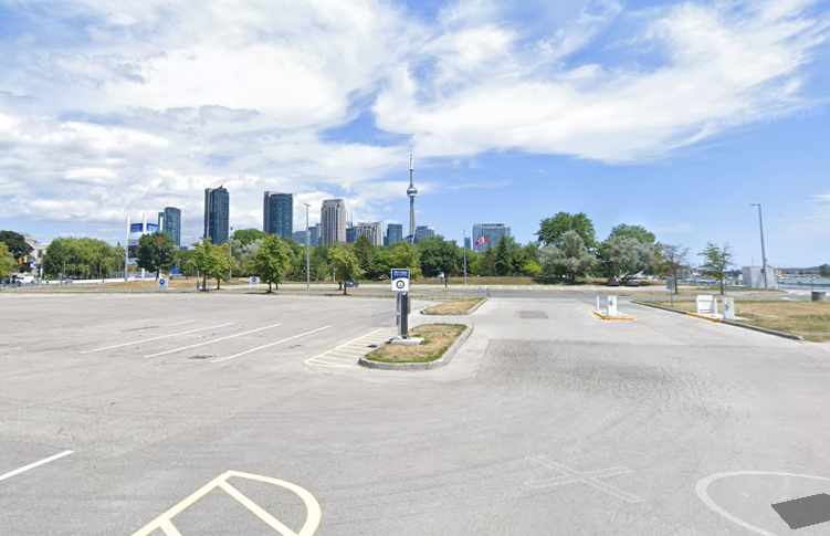 Parking lot near the lakeshore in Toronto with a scene of Toronto's skyline in the background