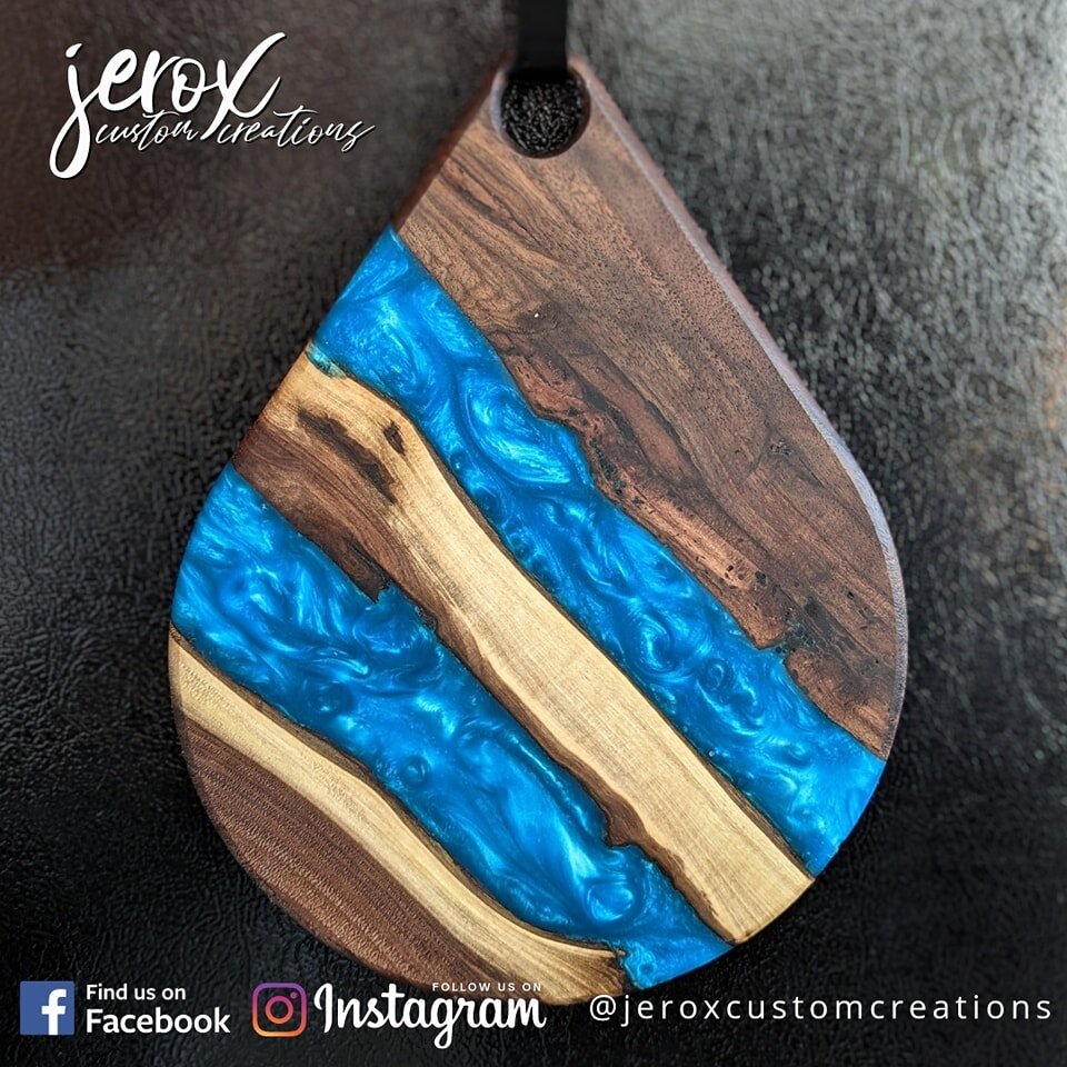 This black walnut and epoxy cheese board came out stunning. The blue pops so well. It's going to its forever home to a dear friend of ours. 
.
.
 #jerox #maker #makersgonnamake #ontario #orangeville #dufferincounty #woodsigns #smallbusiness #shoploca