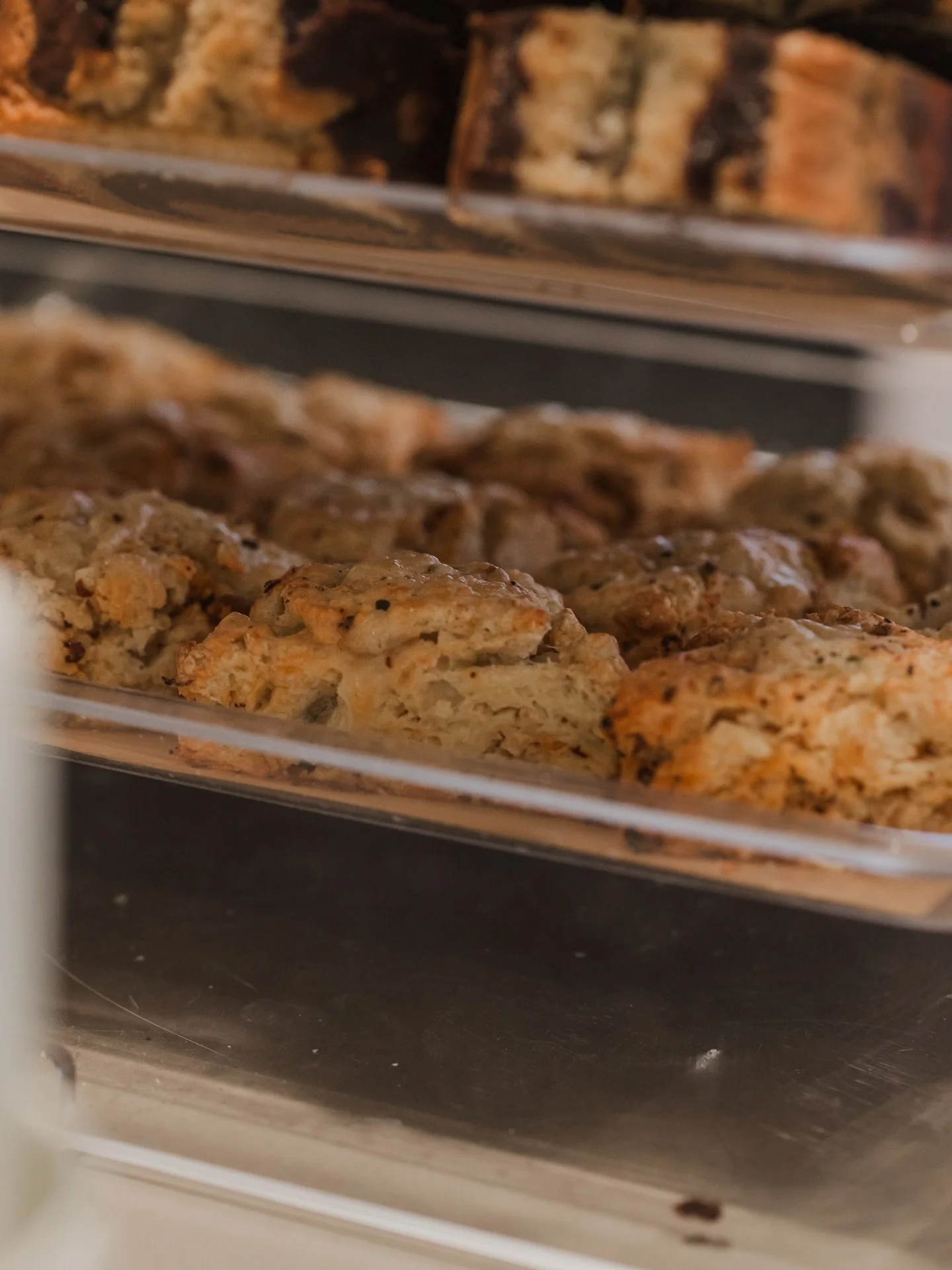 Our favorite scone with our favorite chili chrisp! We love teaming up with @karanchi.foods for our beautiful leek, chili chrisp, and Gruy&egrave;re cheese created by our amazing baker @meara_alyse We have been loving the ability to bake everything in