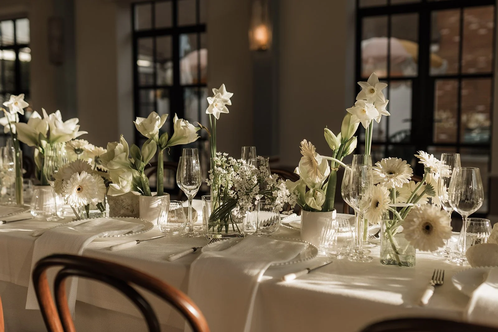 Floral design of spring bulbs and glass for design led wedding Limekiln