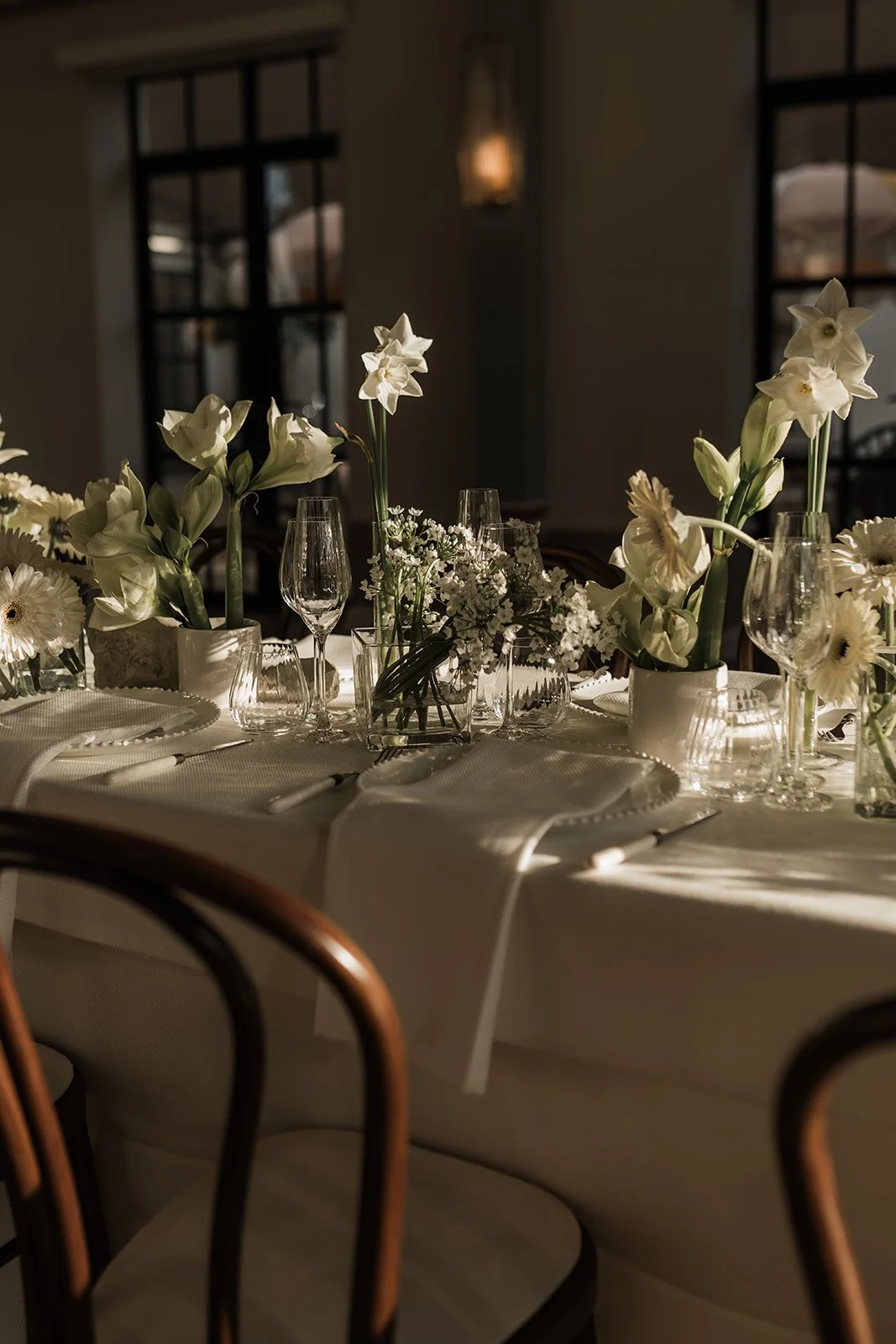 Spring tablescape caught in the sunlight at Limekiln, Sussex. Sister venue of Kin House, Wiltshire.