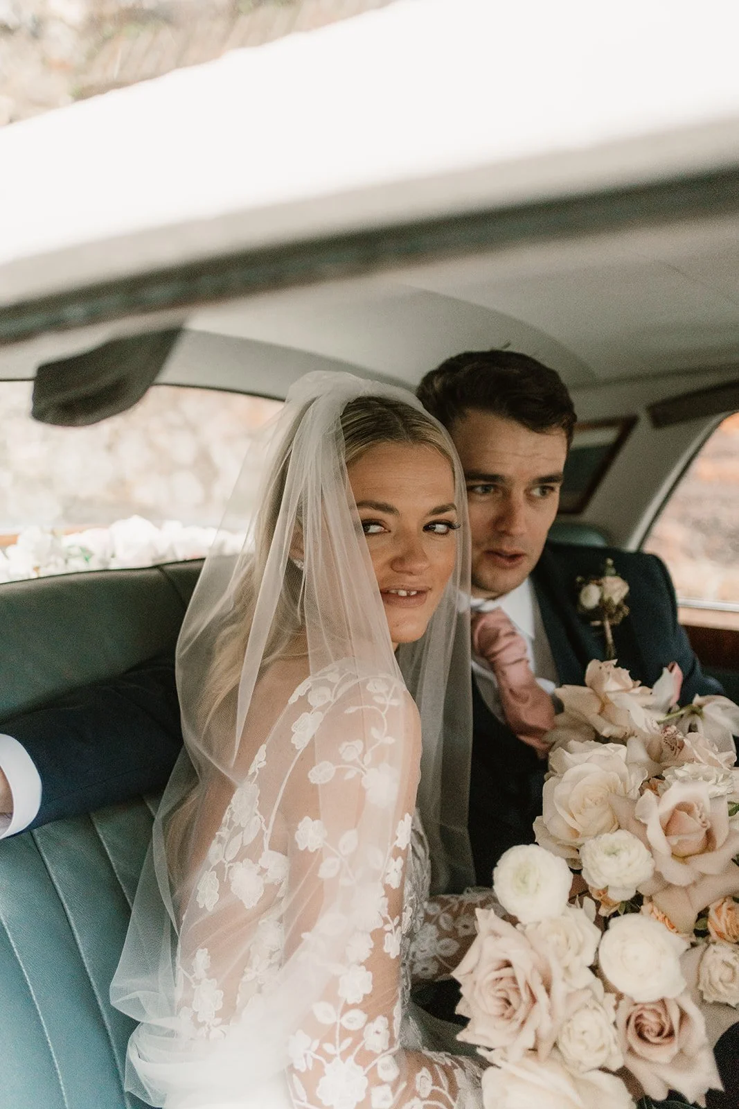Port Lympne wedding, New Years Eve. Roses and Orchids. Bride wore a jumpsuit. Black tie event.