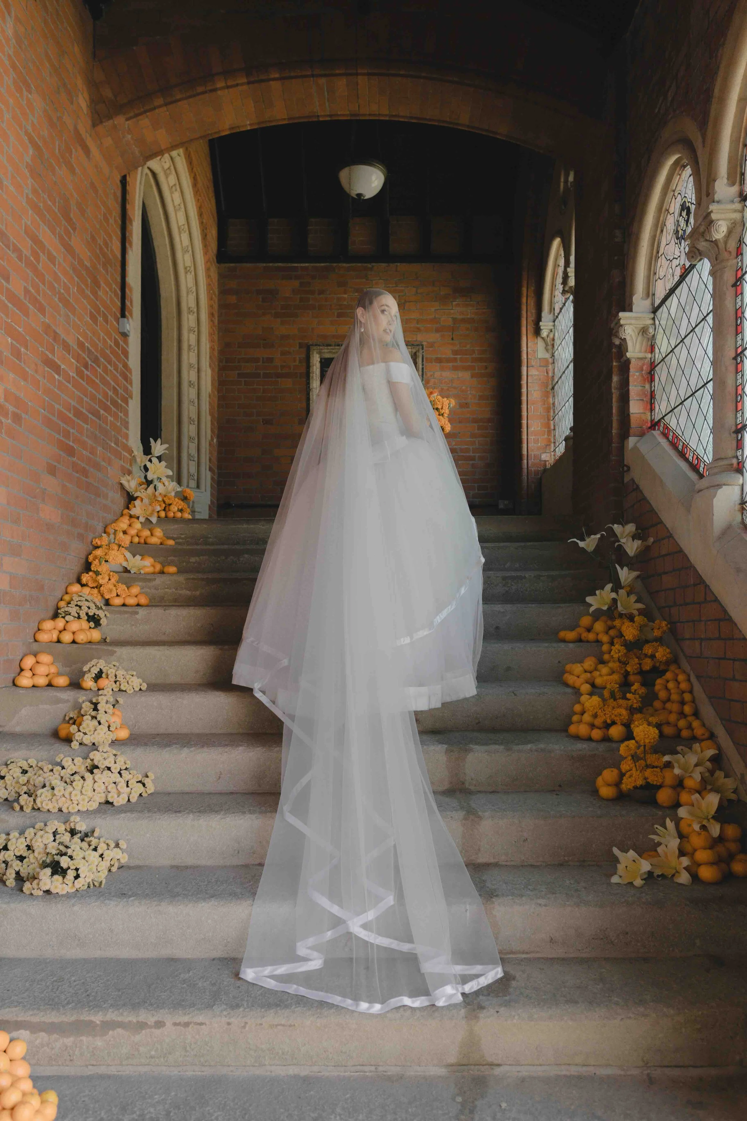 Summer wedding central London citrus installation unusual florals