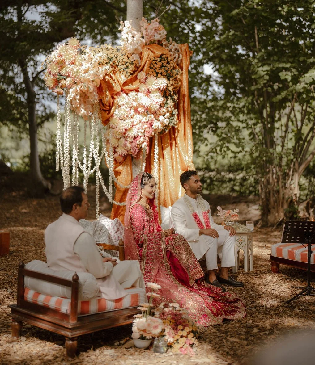 Huge bespoke installation of summer flowers for luxury ceremony in the woodland East Sussex