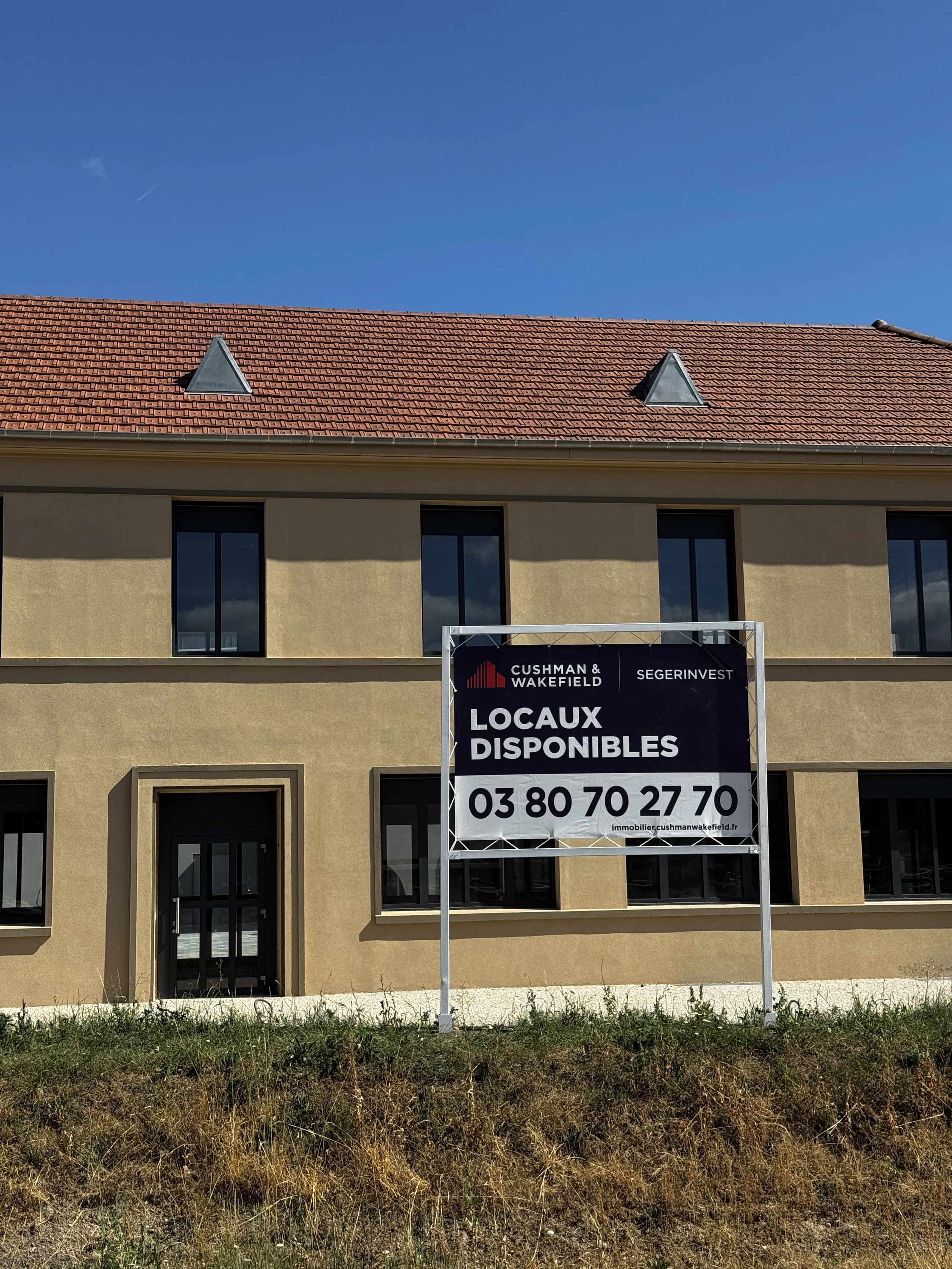 Impression d'une bâche et pose d'une structure pour Cushman & Wakefield Segerinvest
