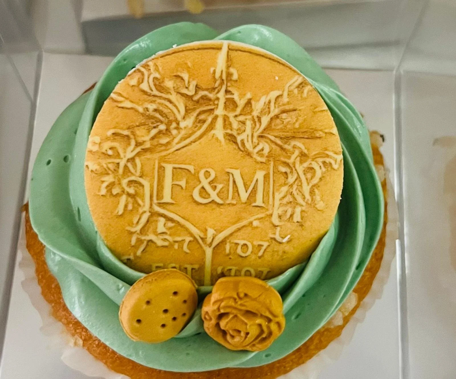 Corporate cupcake featuring a Fortnum &amp; Mason-inspired edible gold coin.