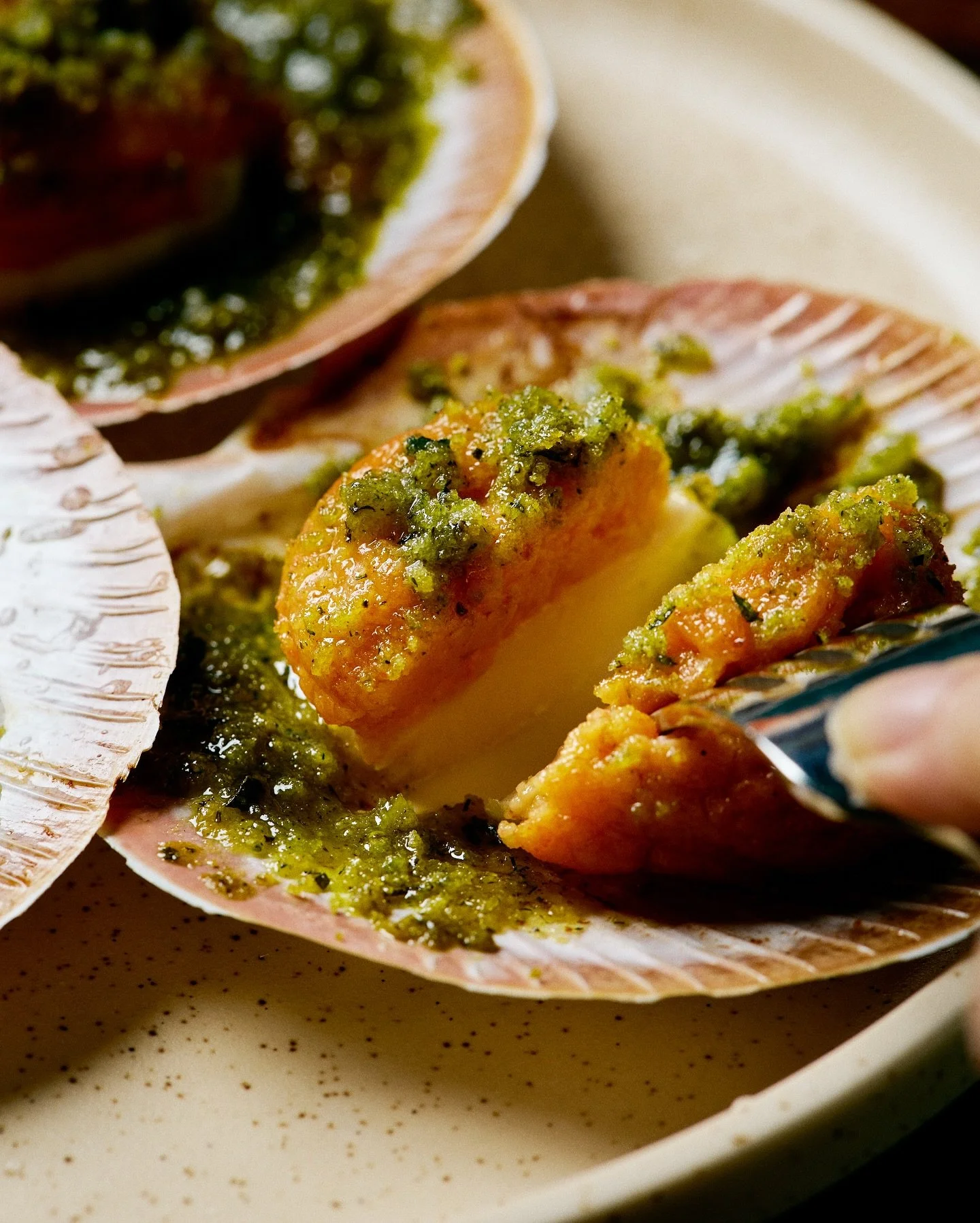 Baked @abrolhosislandscallops, topped with chorizo herb béchamel, the sweet, briny scallops balanced with creamy, spicy, smoky, savoury depth.

🌊One of our favourite and long-running items on the menu, these scallops are from the pristine waters of