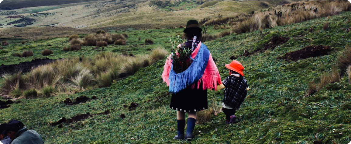  Guangaje, Ecuador: After the blessing of a water spring. A mother with a child returns home. Photo credit: Azzedine Rouichi 