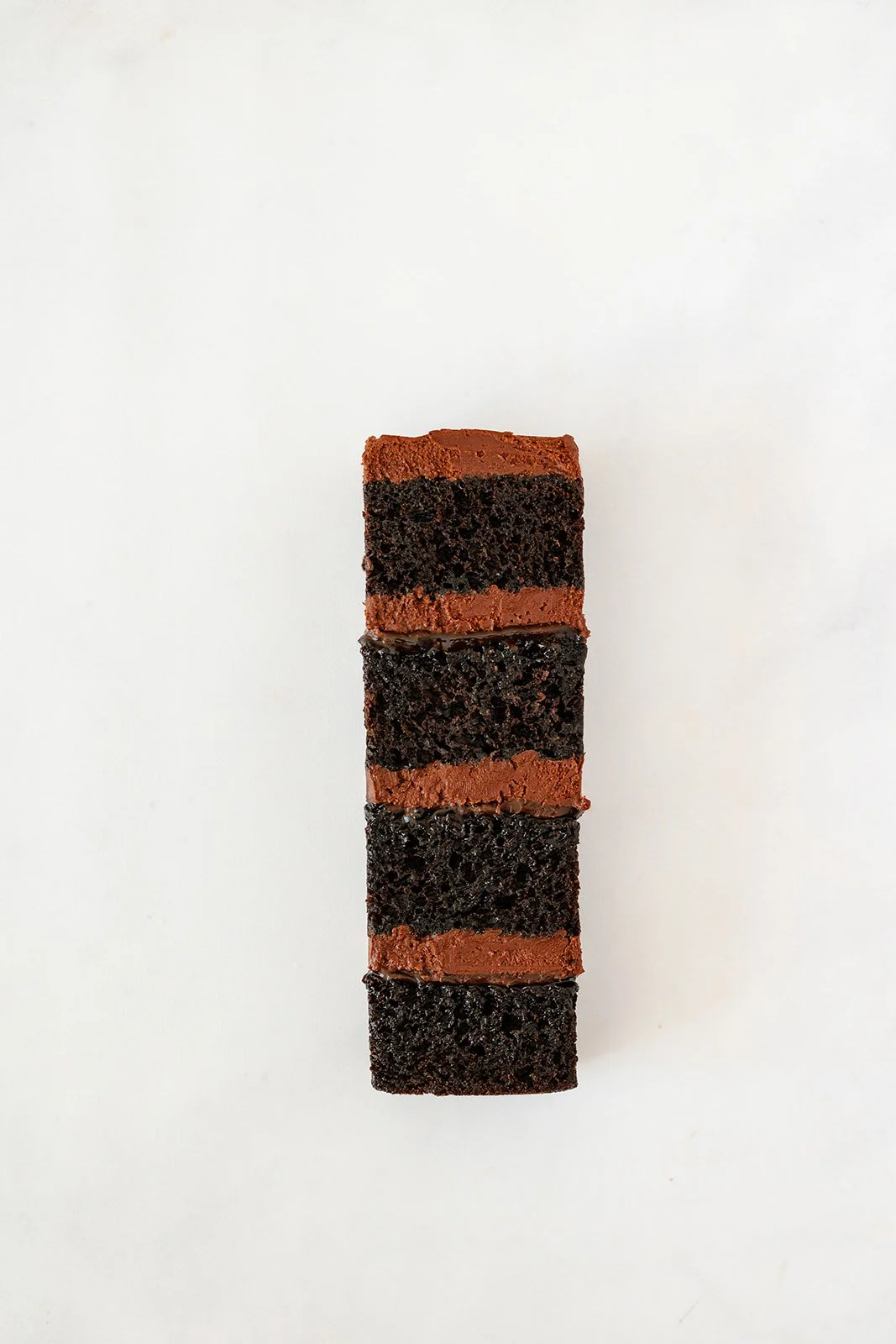 slice of chocolate cake with chocolate buttercream