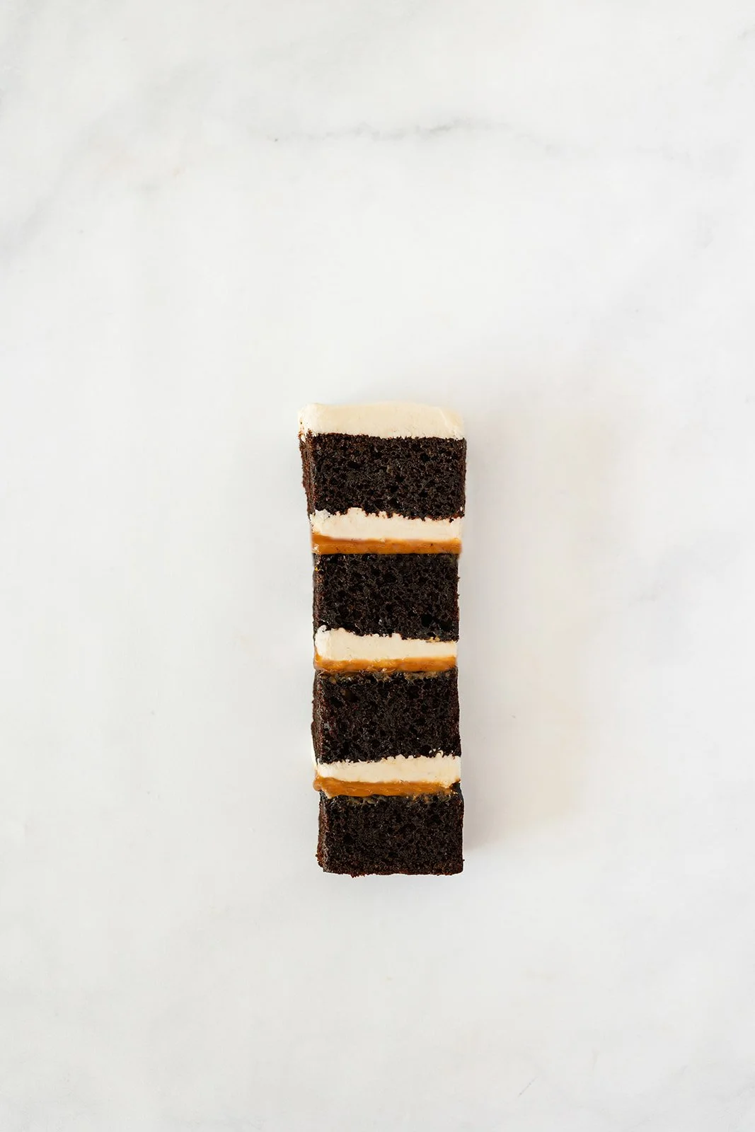 chocolate cake slice with caramel & caramel buttercream