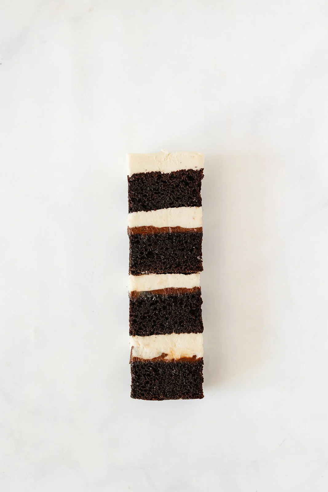 slice of chocolate cake with nutella and vanilla buttercream