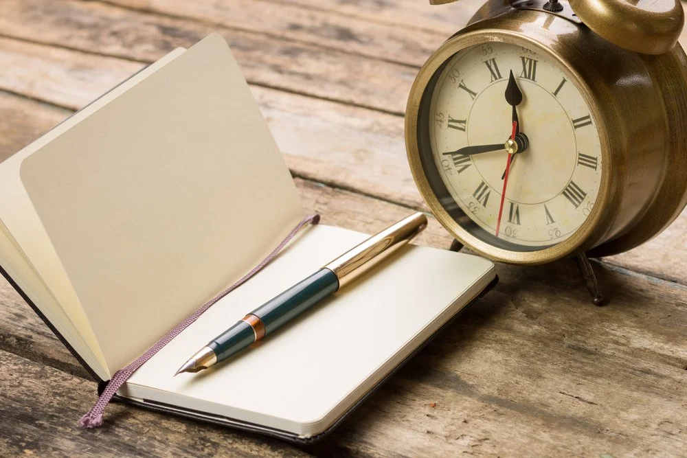 Clock and Notebook.jpg