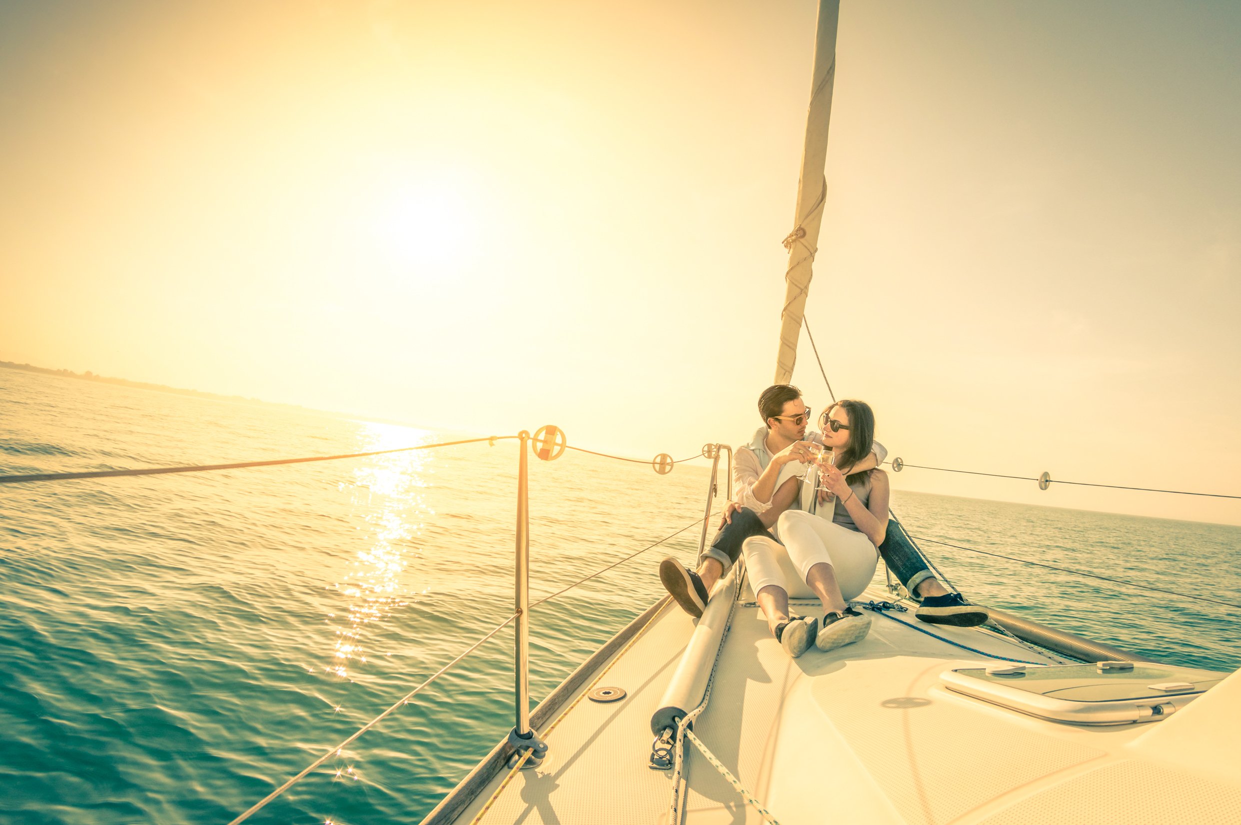 Couple with champagne on Sailing boat.jpg