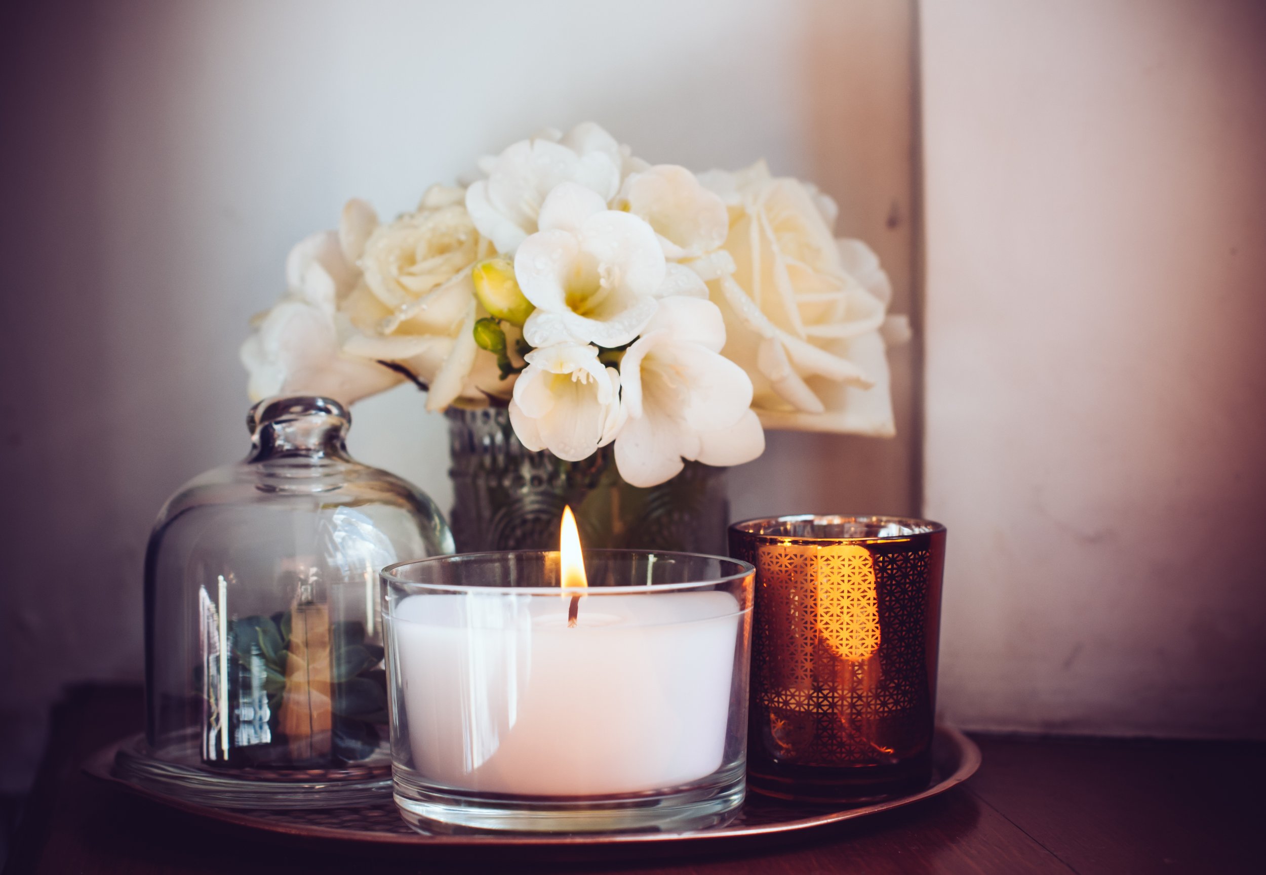 Candle with white flowers.jpg