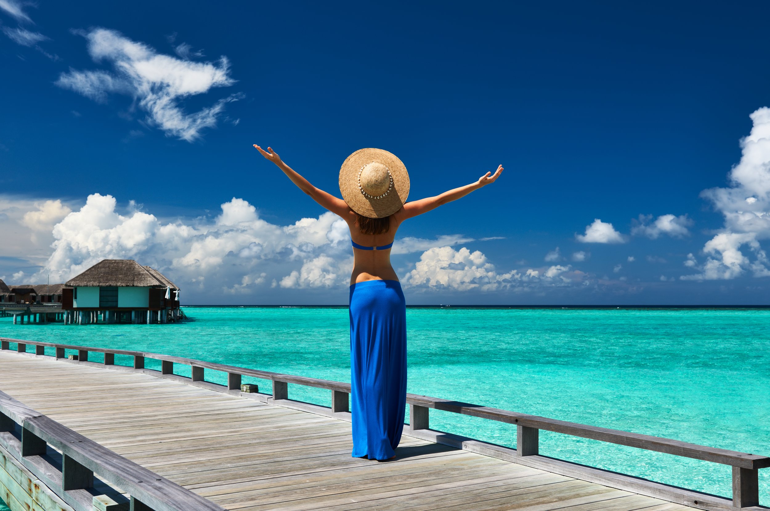 Woman on Jetty of Water Bungalows.jpg