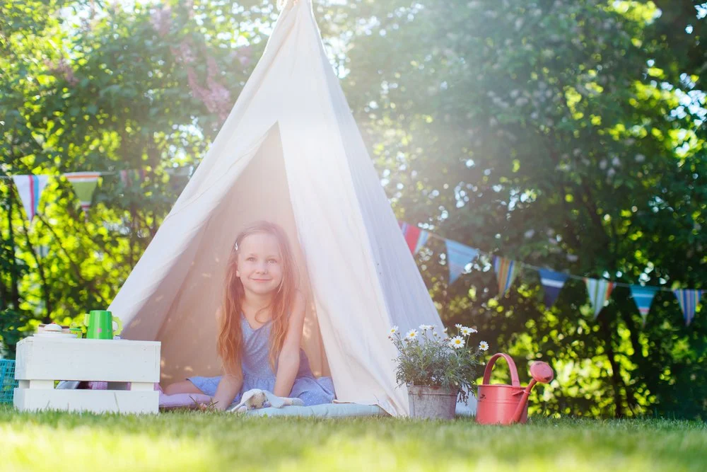 Child in Tipi in Garden.jpg