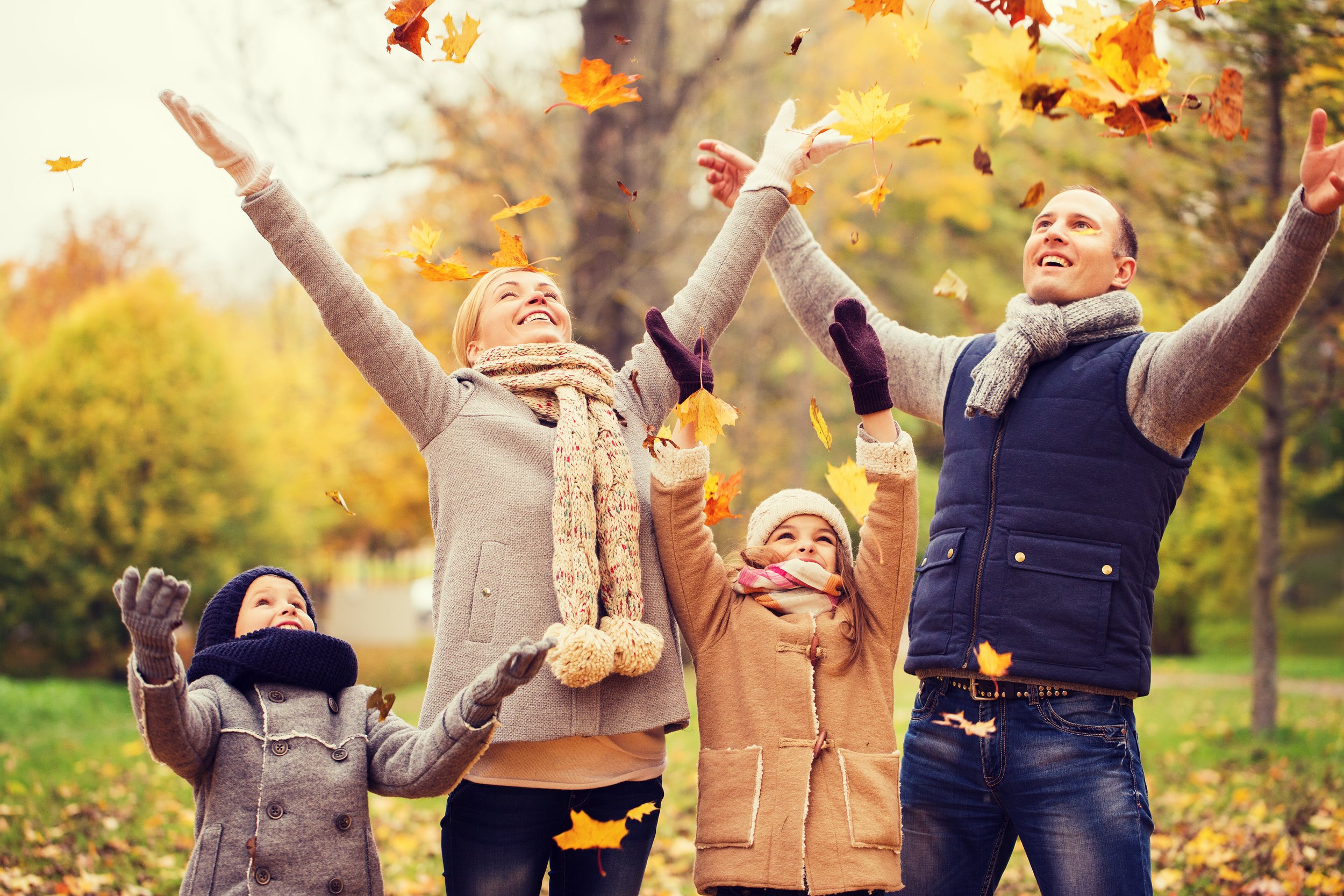 Family with Autumn leaves.jpg