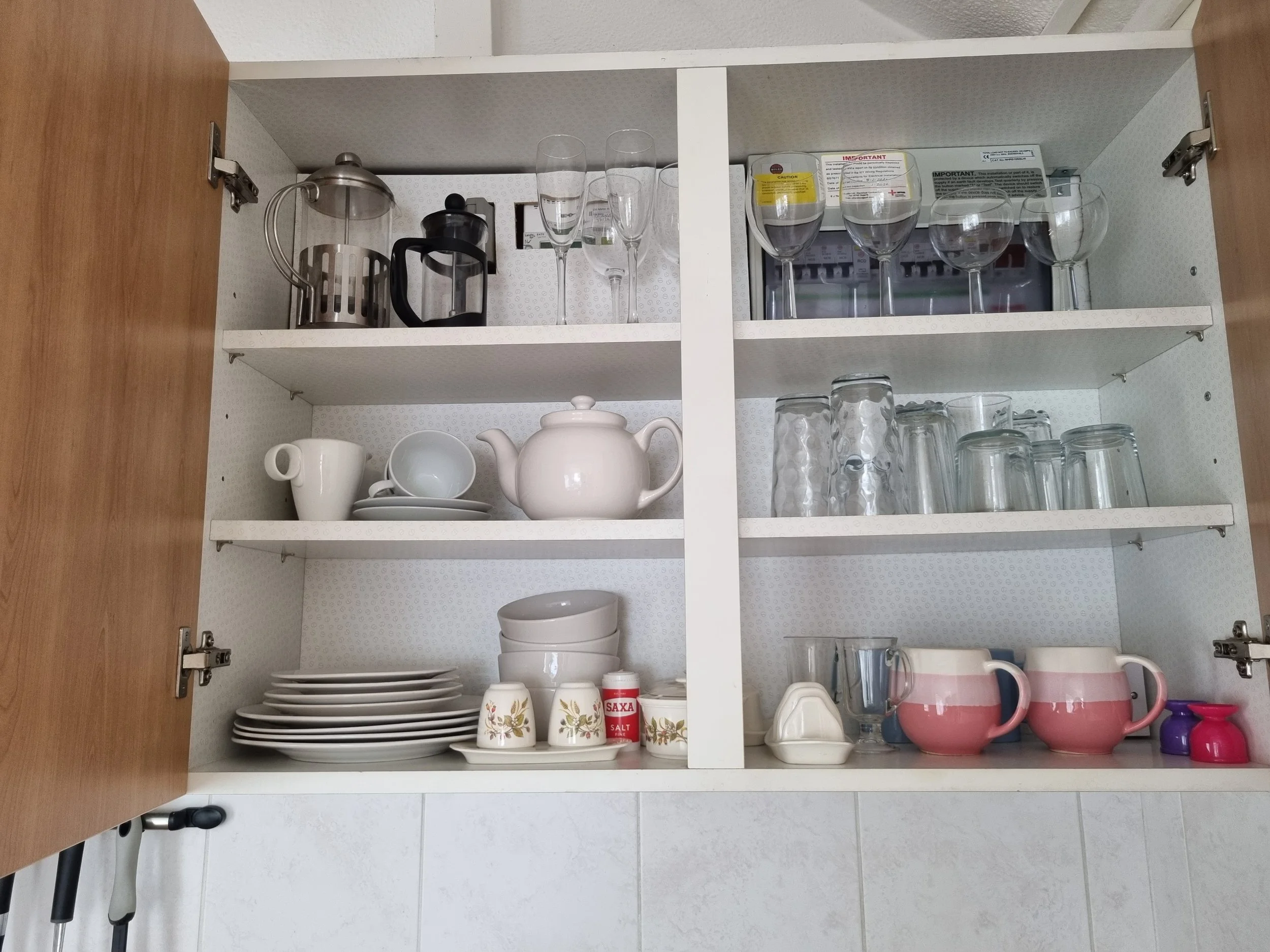 Lots of crockery and glasses in the kitchen cupboard.  Enjoy morning coffee or afternoon tea - teapot and cafetiere provided. 