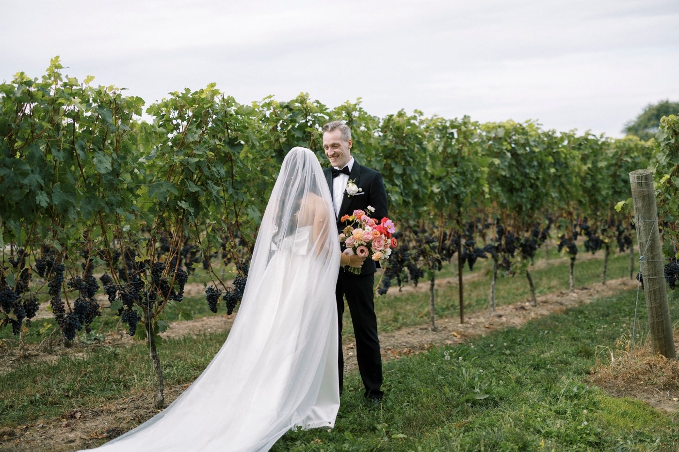 Wedding first look at Cave Spring Vineyard