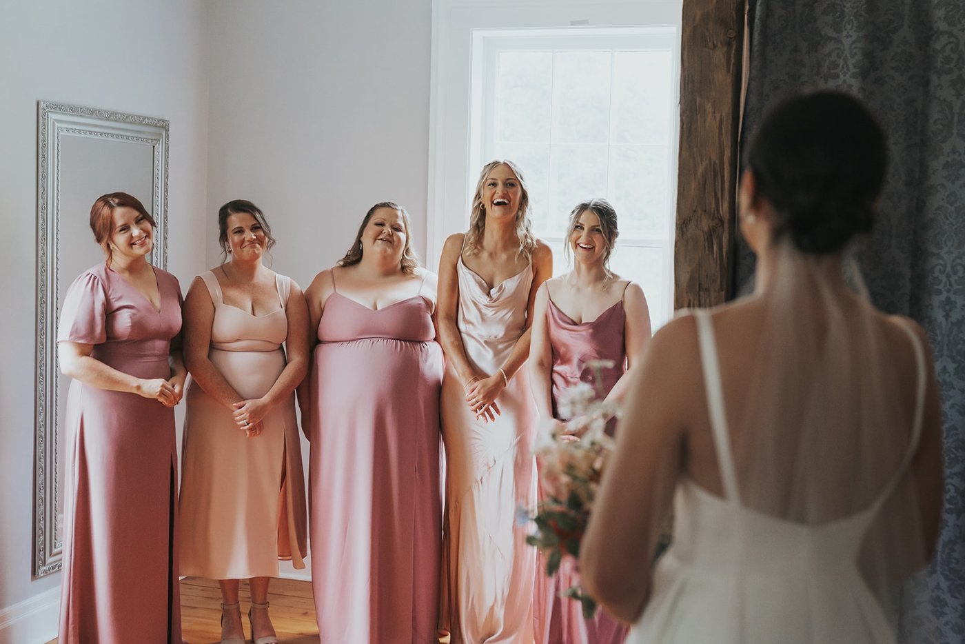 First look with bridesmaids at a Niagara wedding
