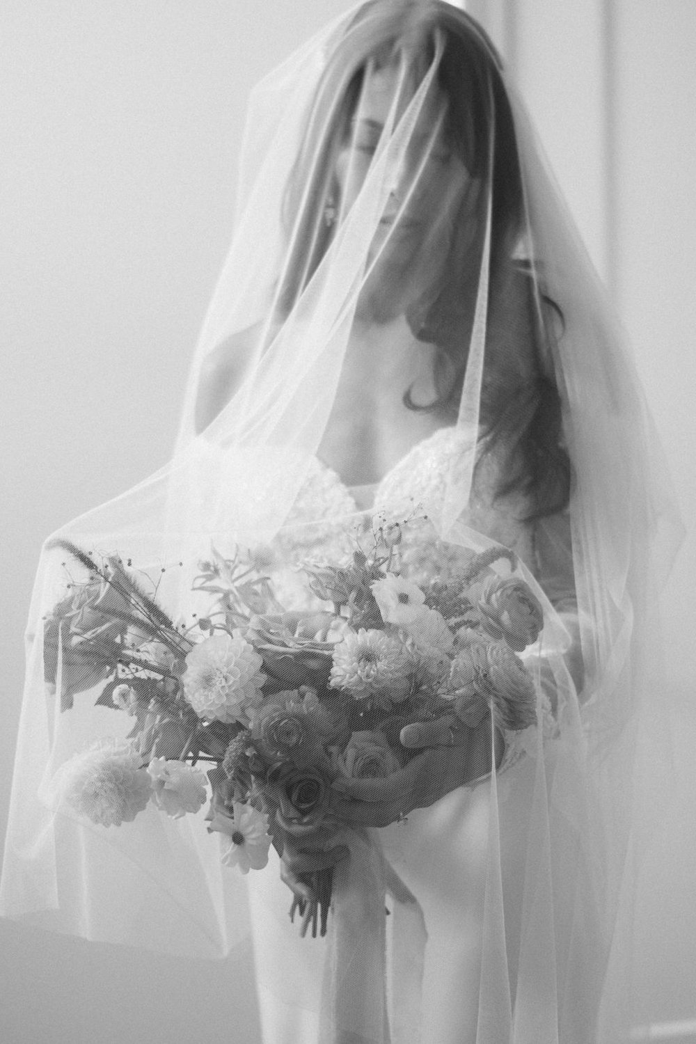 Black and White bridal portraits captured by Ugo Photography at Wakefield Estate.