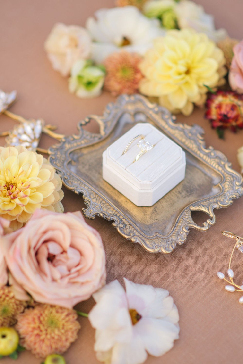 Linen Mrs Box with gold engagement ring with Blair Nadeau's wedding accessories.
