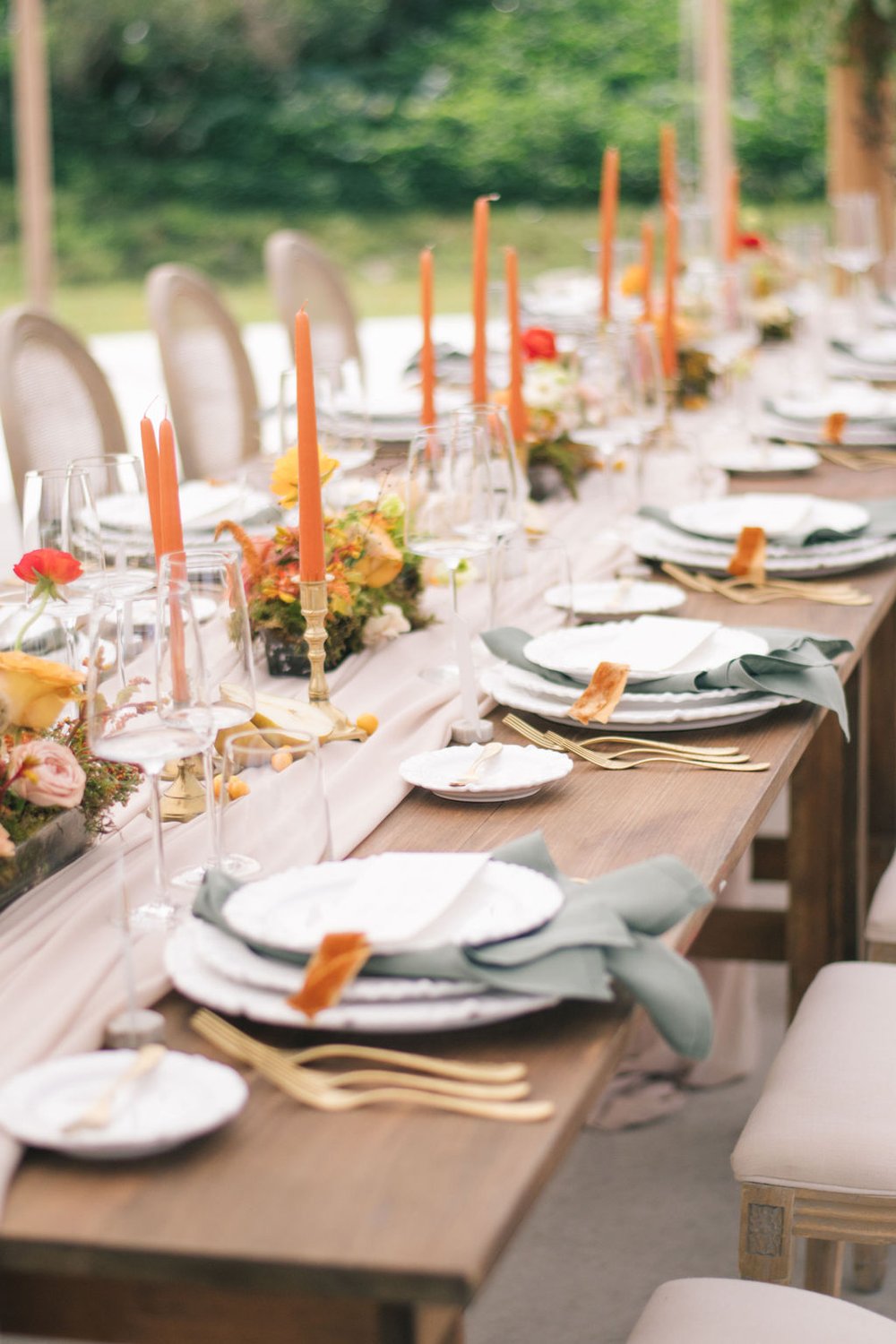 Fall inspired wedding table scape with taupe chiffon runners, Sonoma chairs, and harvest tables at Wakefield Estate.