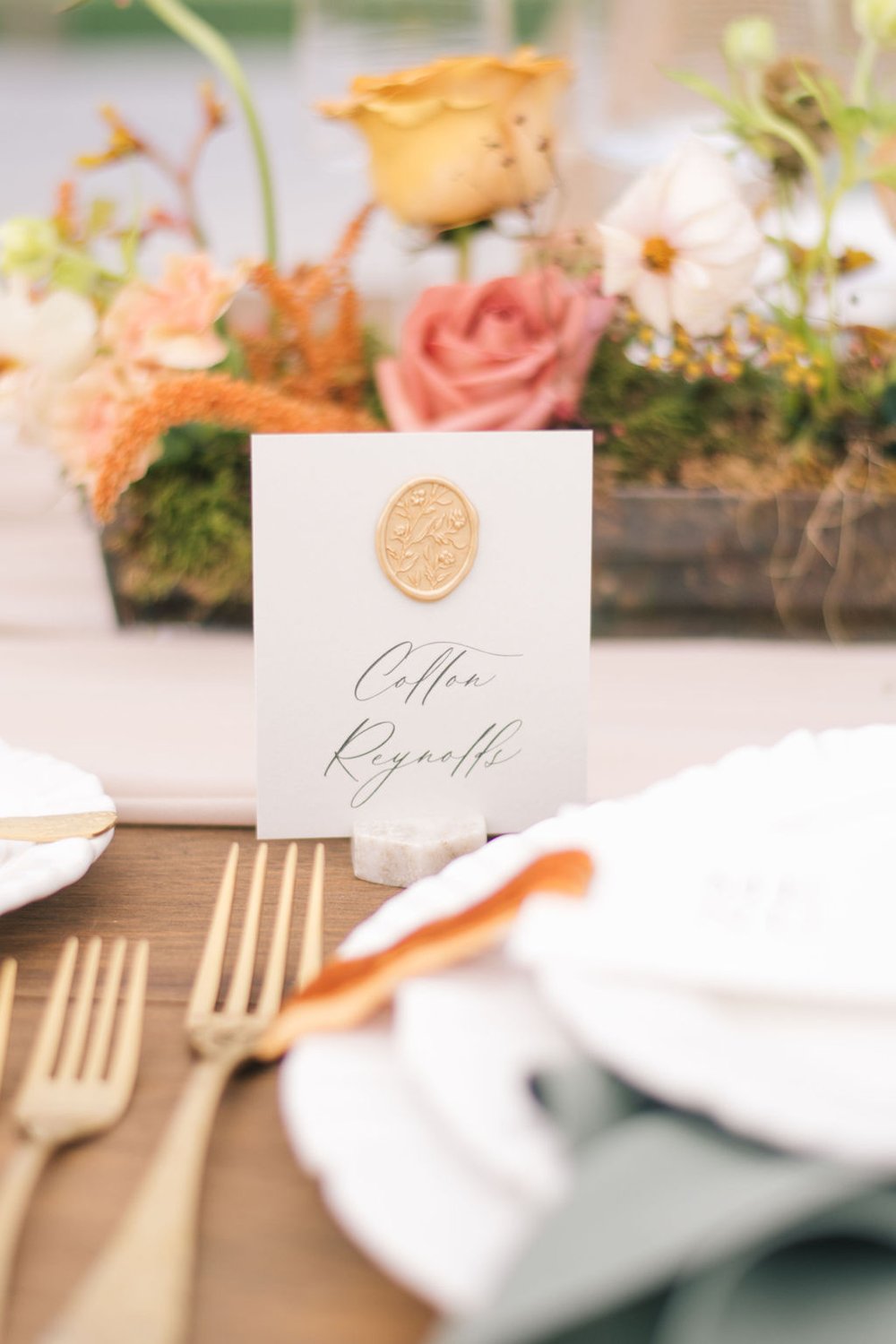 Custom place card with olive green napkin and gold floral cutlery from Simply Beautiful Decor.