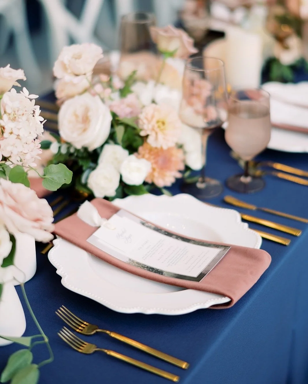 Alisha and Patrick&rsquo;s wedding at the Art Gallery of Hamilton was the perfect bridge between seasons. Elegant navy paired with layers of pinks and whites created a timeless palette, sophisticated yet soft, blending late-summer vibrance with the c