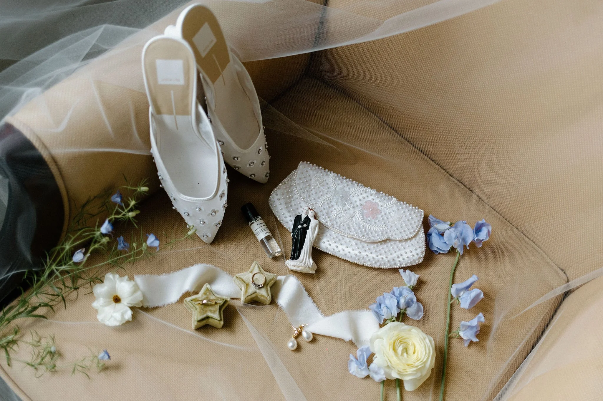  Flatlay details for the bride and groom getting ready for their wedding day at The Clearing, London, Ontario. 