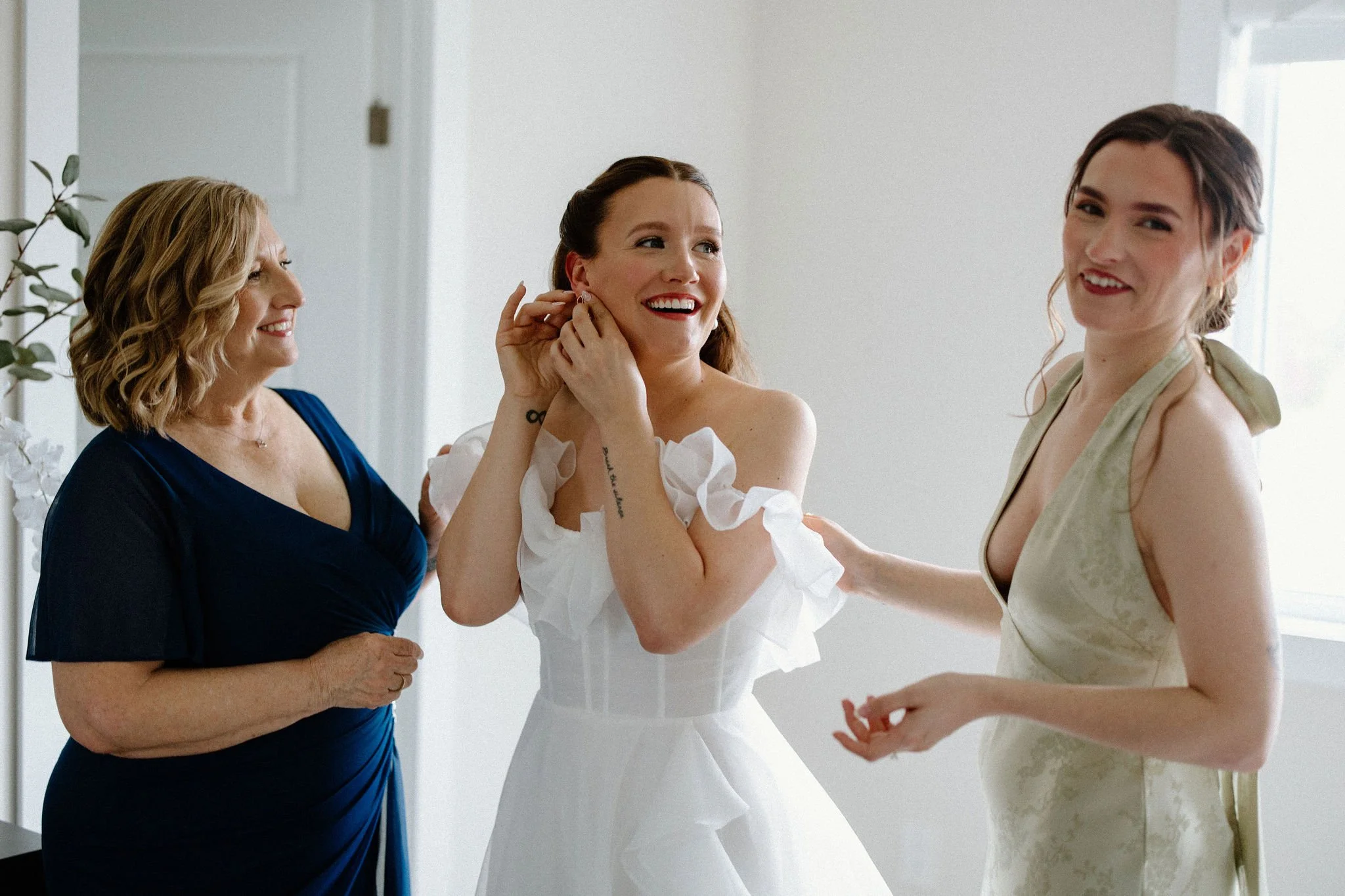  Bride getting ready the morning of her wedding, captured by Joey Ventura Photography. 