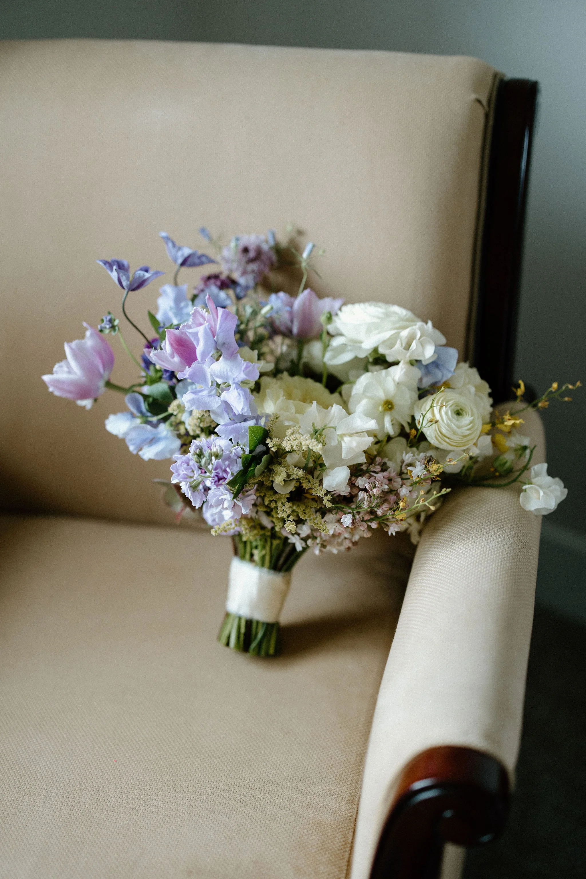  Purple and yellow spring bridal bouquet designed by Forever Wildfield. 