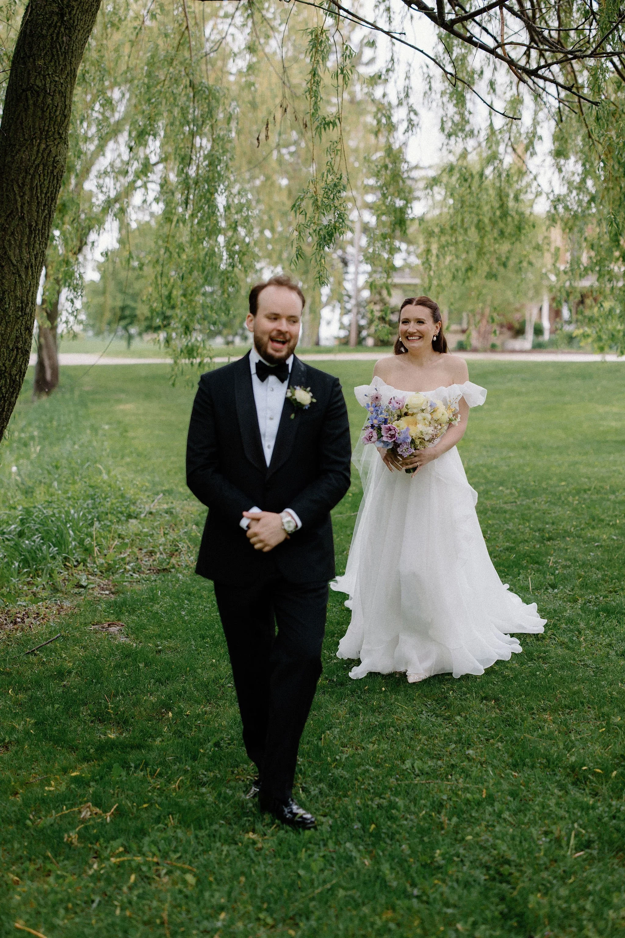 There is something undeniably poetic about an outdoor rainy wedding. At The Clearing, L+M embraced the elements for their whimsical garden-inspired day. Against the lush, mist-covered backdrop of the venue, a bold colour story of yellow and purple t