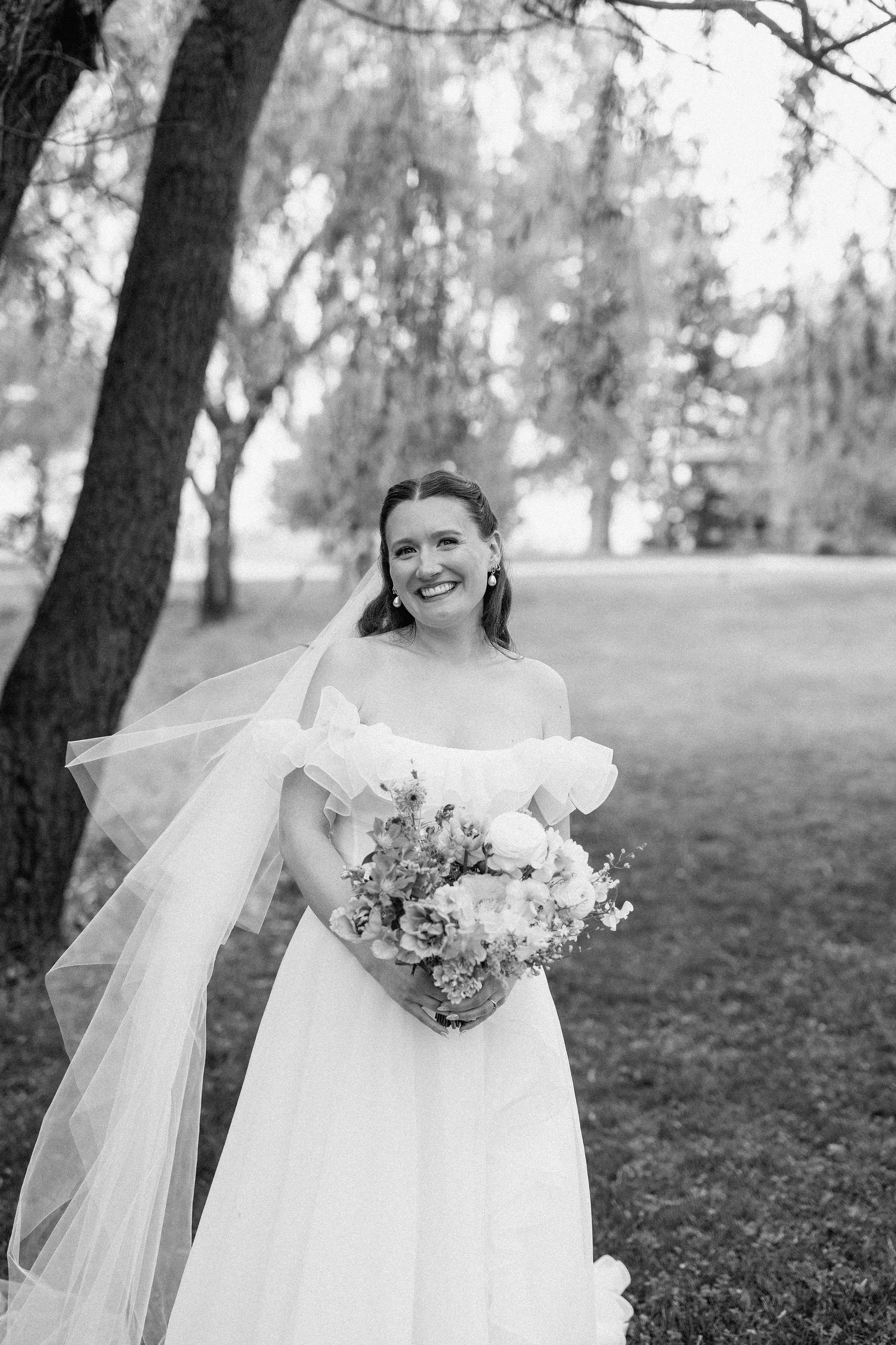  Black and white portrait of the bride captured by Joey Ventura Photography at The Clearing. 