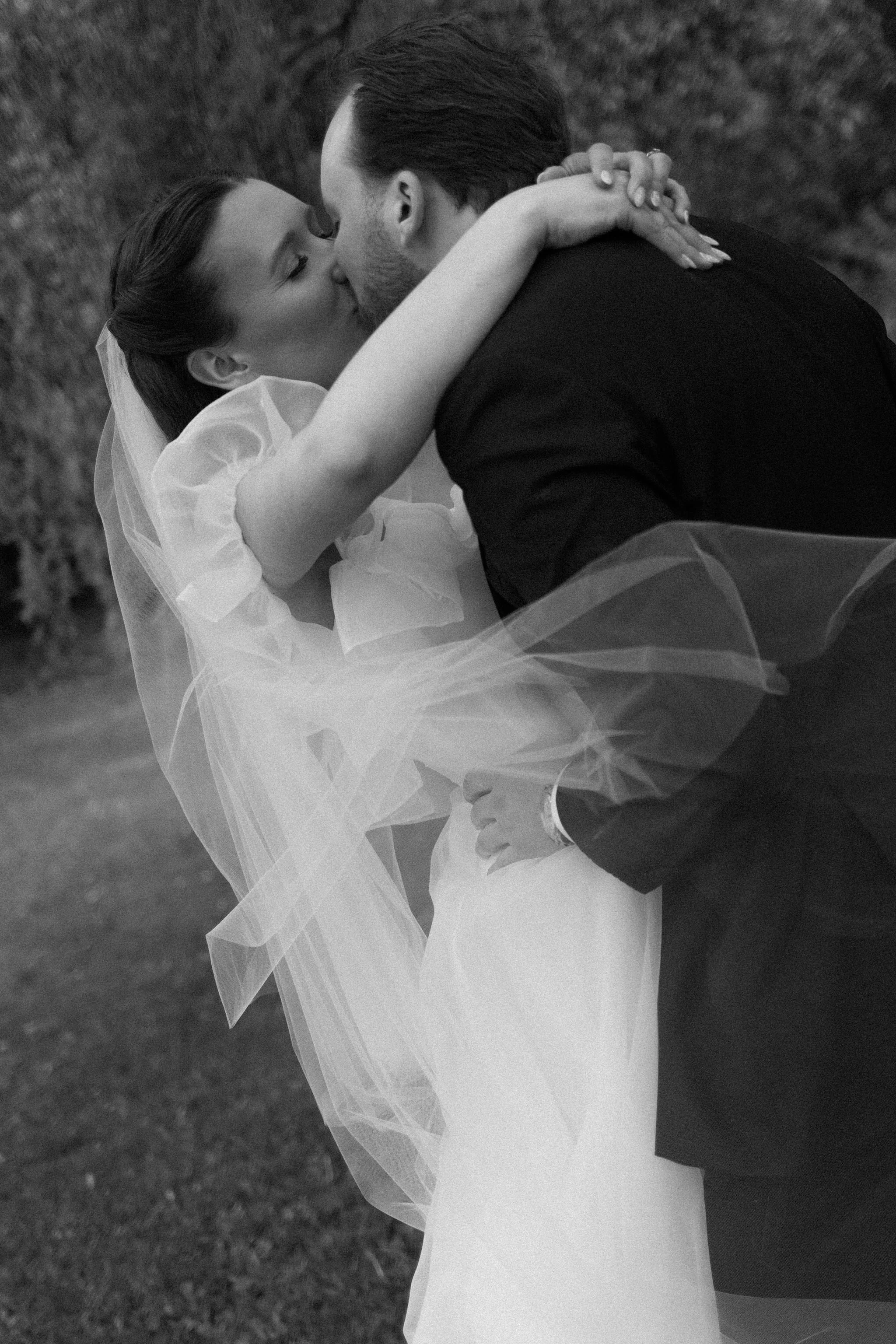 When the skies opened up for Lindsay and Matthew’s wedding at The Clearing, it didn't dampen the mood, instead, it set the stage for some of the most breathtaking portraits of the season. Working seamlessly with the overcast, dramatic lighting,  Joe