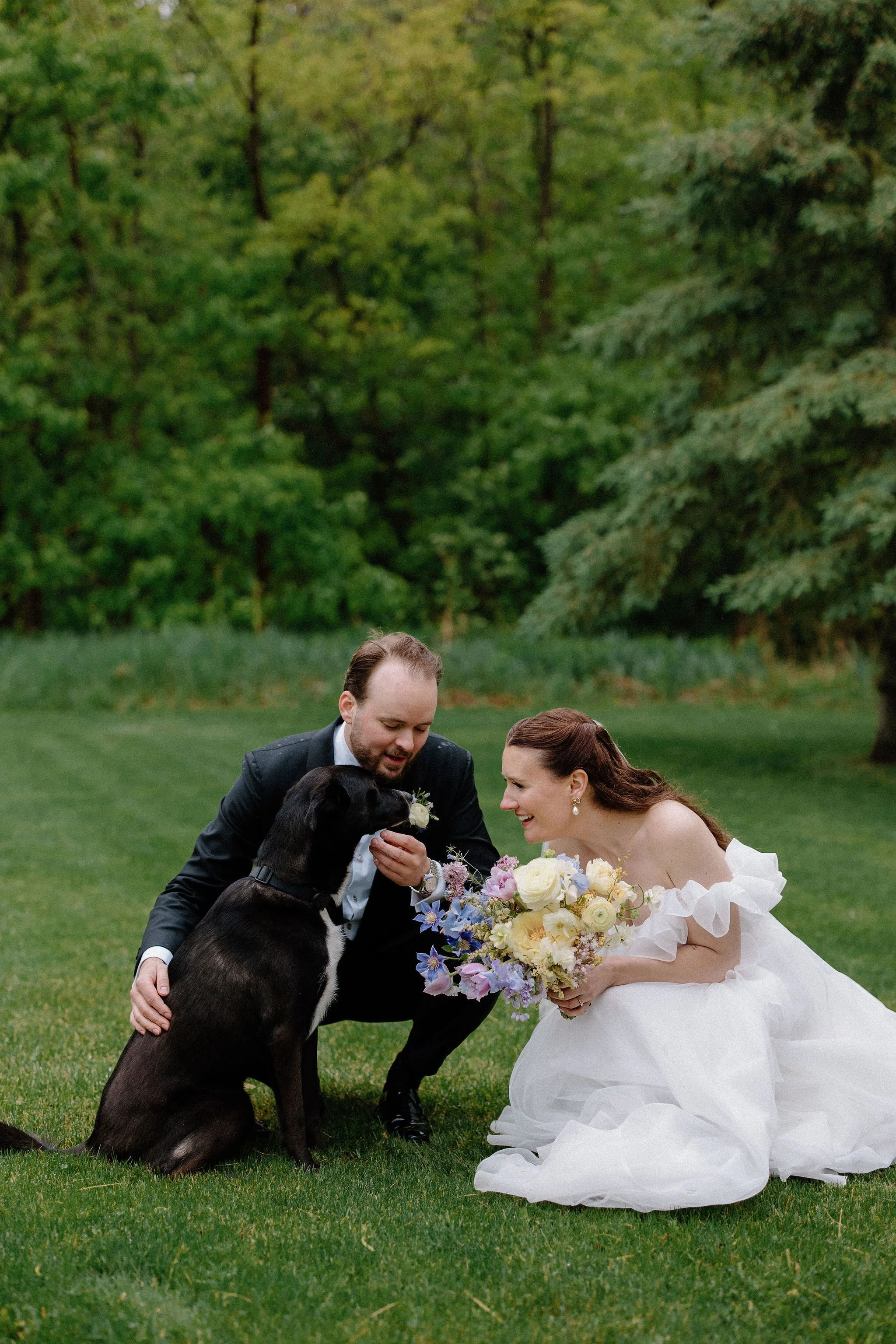  When the skies opened up for Lindsay and Matthew’s wedding at The Clearing, it didn't dampen the mood, instead, it set the stage for some of the most breathtaking portraits of the season. Working seamlessly with the overcast, dramatic lighting,  Joe