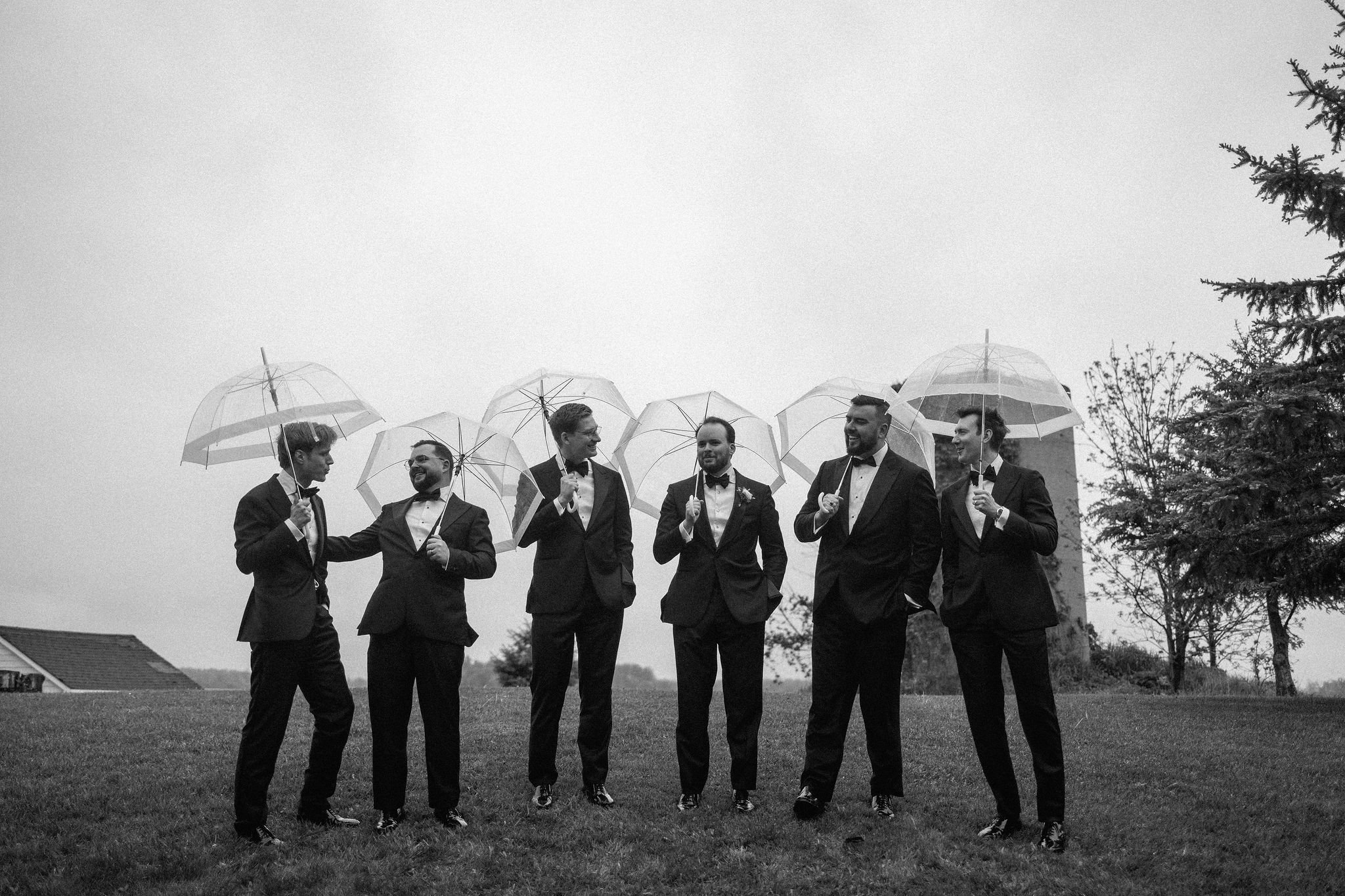  When the skies opened up for Lindsay and Matthew’s wedding at The Clearing, it didn't dampen the mood, instead, it set the stage for some of the most breathtaking portraits of the season. Working seamlessly with the overcast, dramatic lighting,  Joe