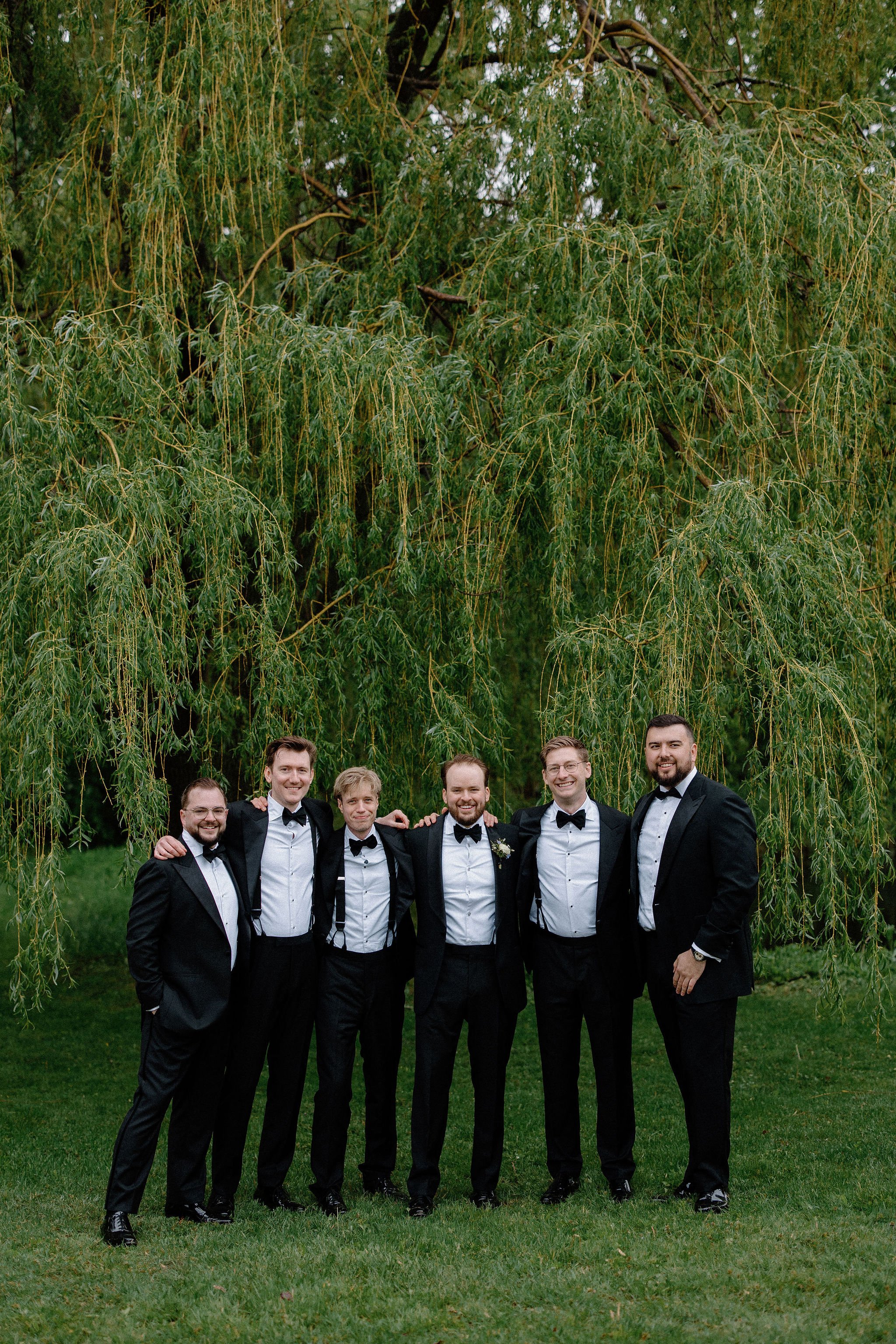  When the skies opened up for Lindsay and Matthew’s wedding at The Clearing, it didn't dampen the mood, instead, it set the stage for some of the most breathtaking portraits of the season. Working seamlessly with the overcast, dramatic lighting,  Joe
