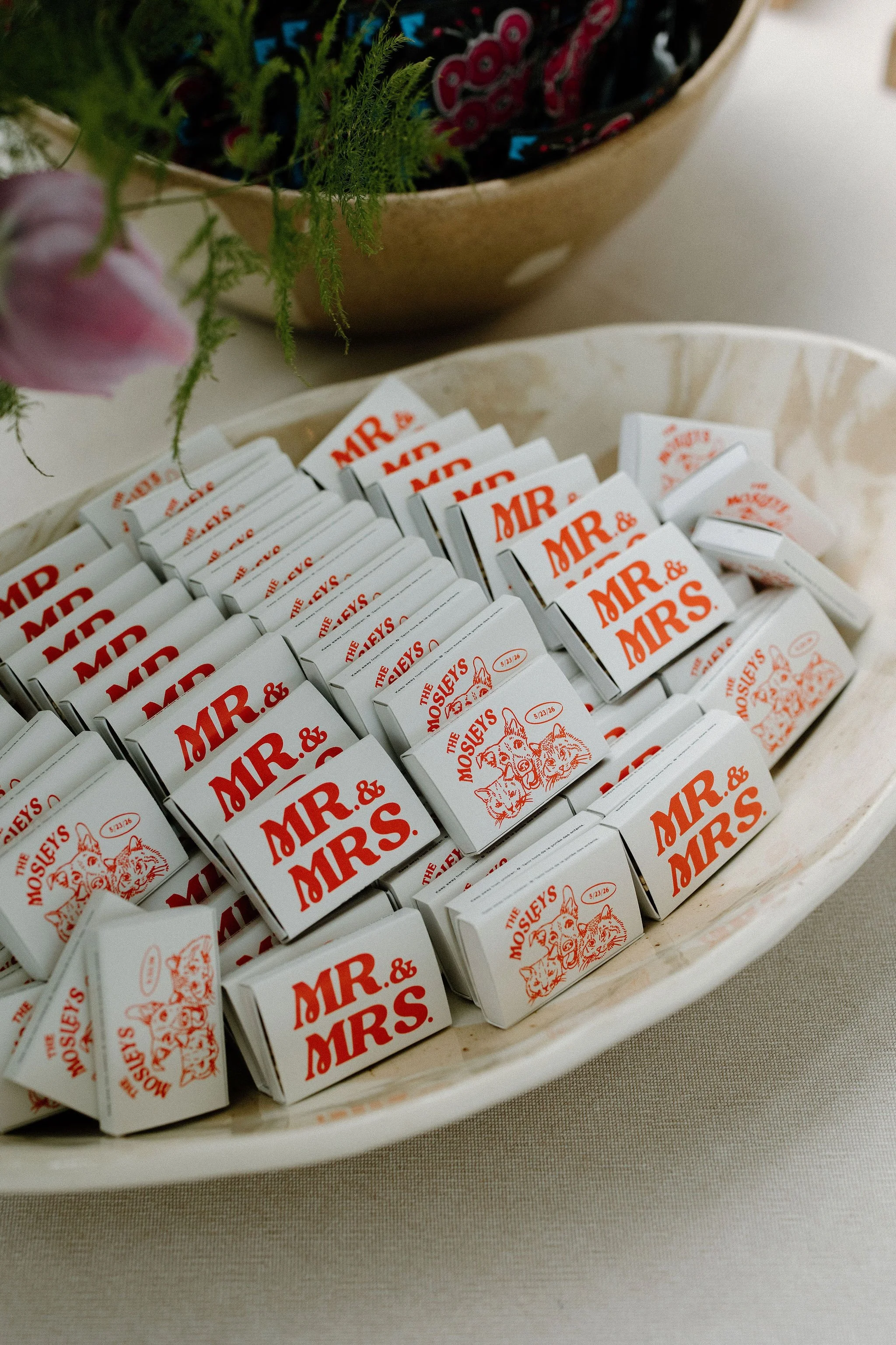 Custom matches books designed by the couple for their guest favours. 