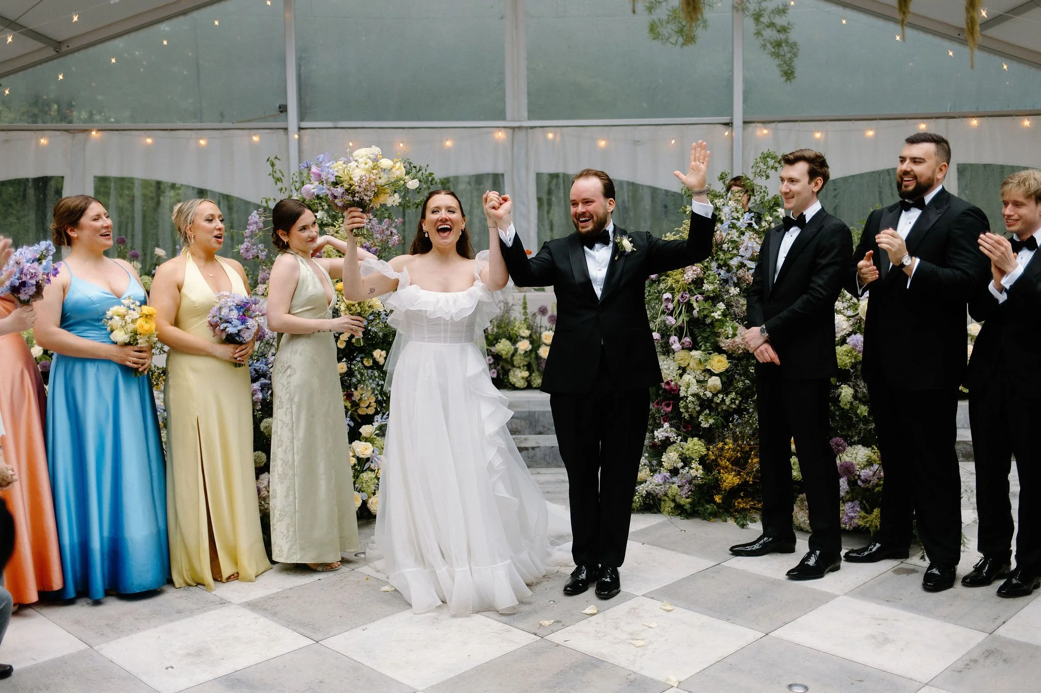  L+M’s wedding at The Clearing beautifully demonstrated how to embrace an outdoor rainy wedding day with absolute elegance. Moving their ceremony inside the venue's clear-top tent created an incredibly intimate and romantic atmosphere.  The space was