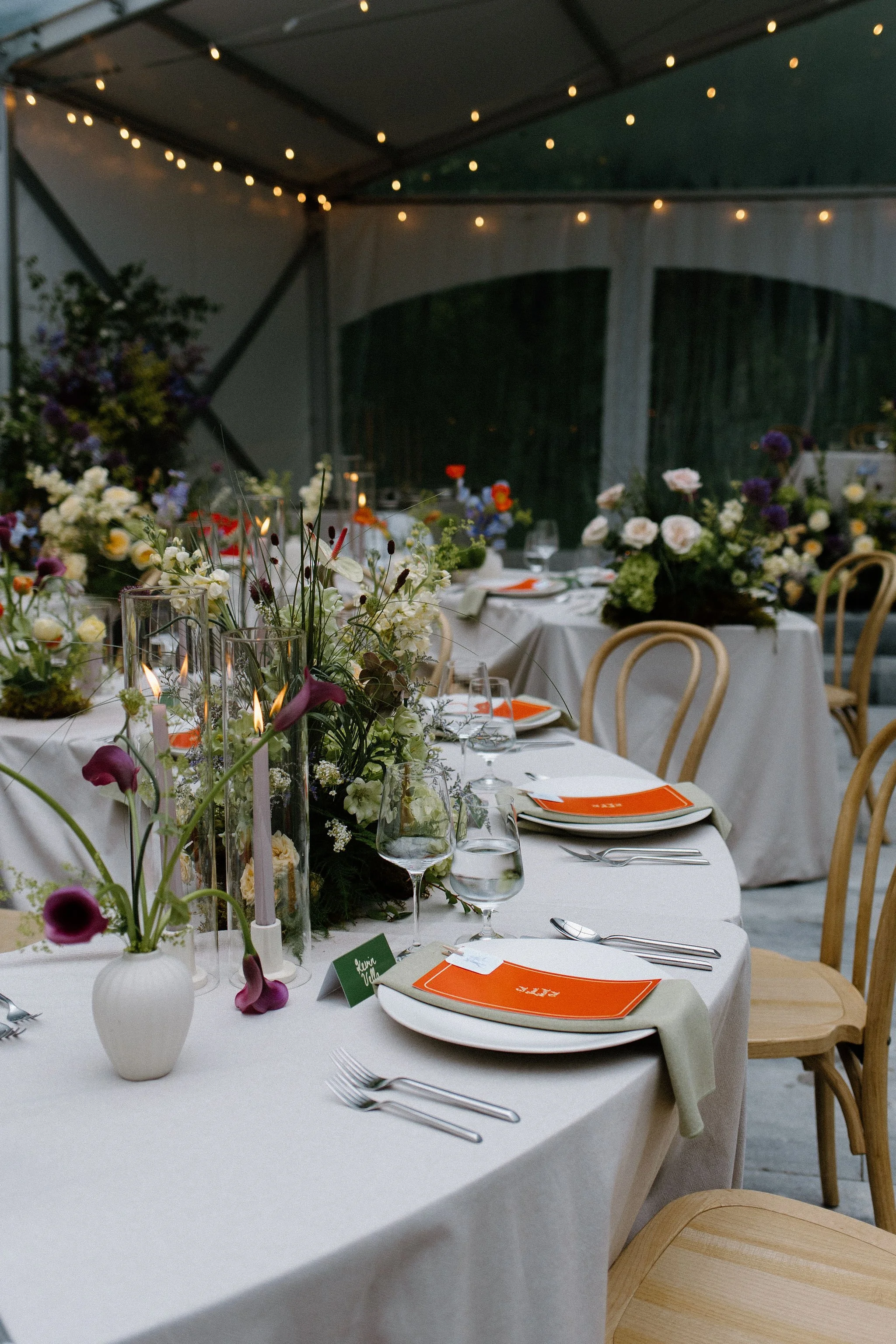  L+M’s wedding at The Clearing beautifully demonstrated how to embrace an outdoor rainy wedding day with absolute elegance. Moving their ceremony inside the venue's clear-top tent created an incredibly intimate and romantic atmosphere.  The space was