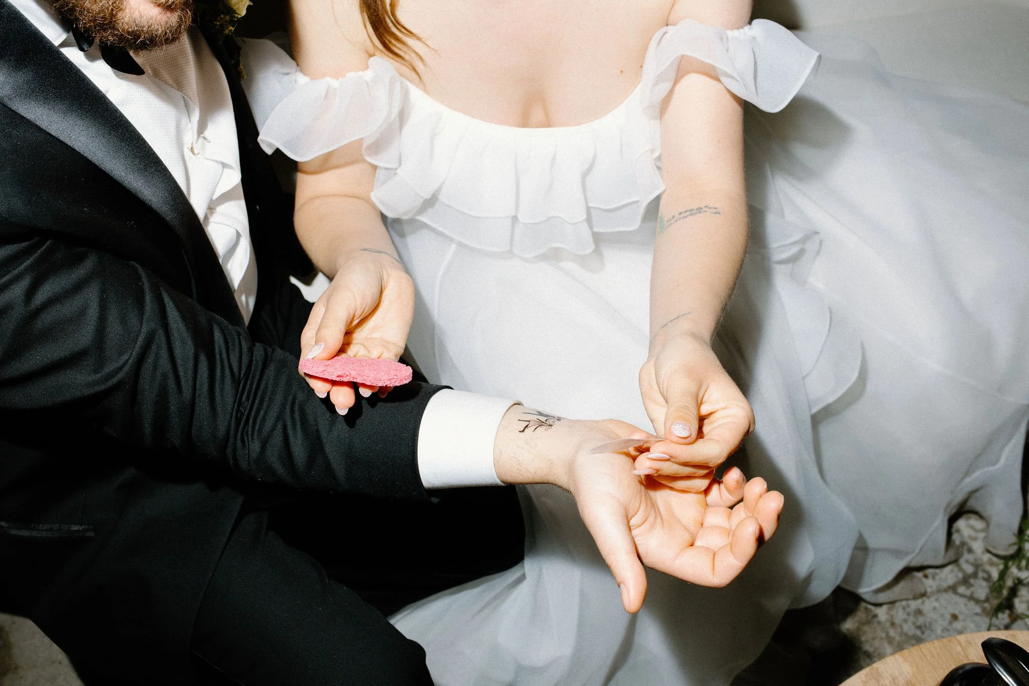  Custom wedding tattoos are enjoyed by the couple and guests to add a fun flair to the wedding reception and dancing. 