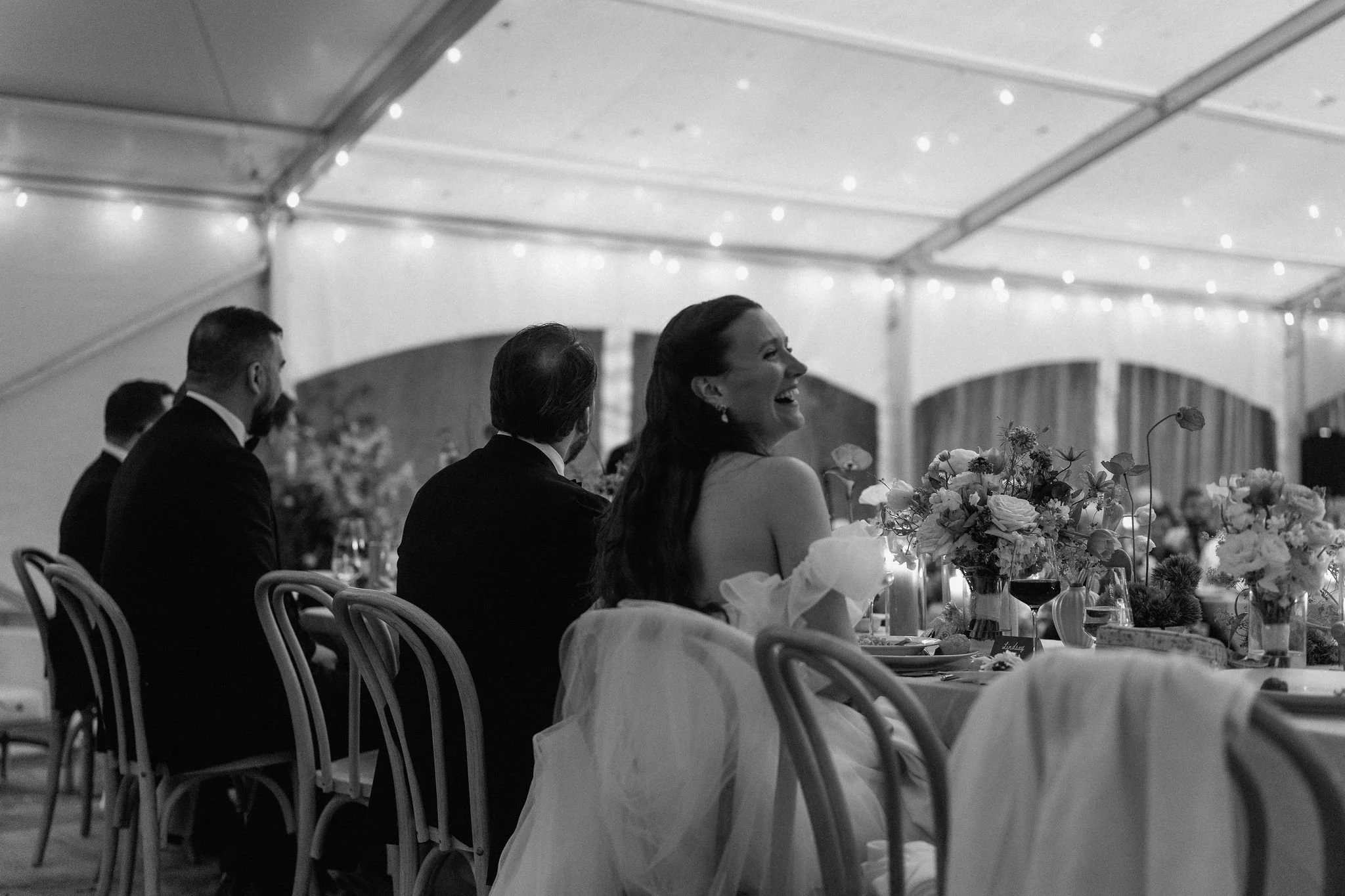  Who says rain has to dampen your wedding day aesthetic? L+M didn’t let a few showers stop them from having the whimsical garden wedding of their dreams at The Clearing. In fact, the moody, overcast light made their vibrant yellow and purple color pa