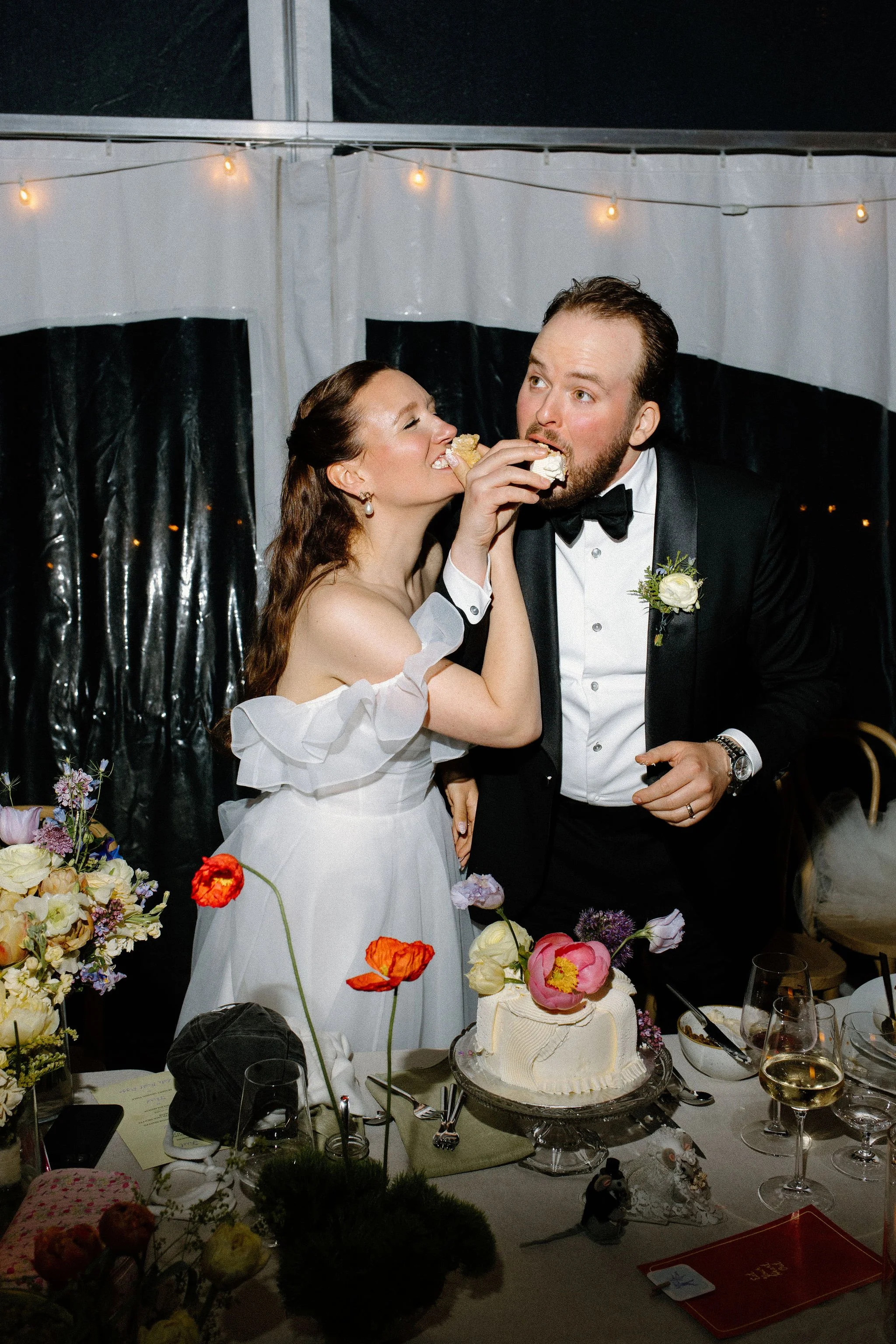 Cake cutting with the Bride and Groom, cake created by Libibet Cakery. 
