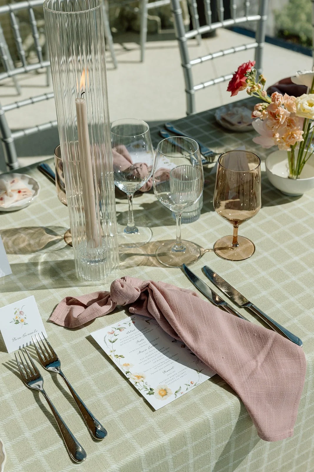  Detail shot of a luxury bridal shower place setting. Elevate your event with our custom styling services, featuring curated textiles, botanical menus, and delicate garden centerpieces. 