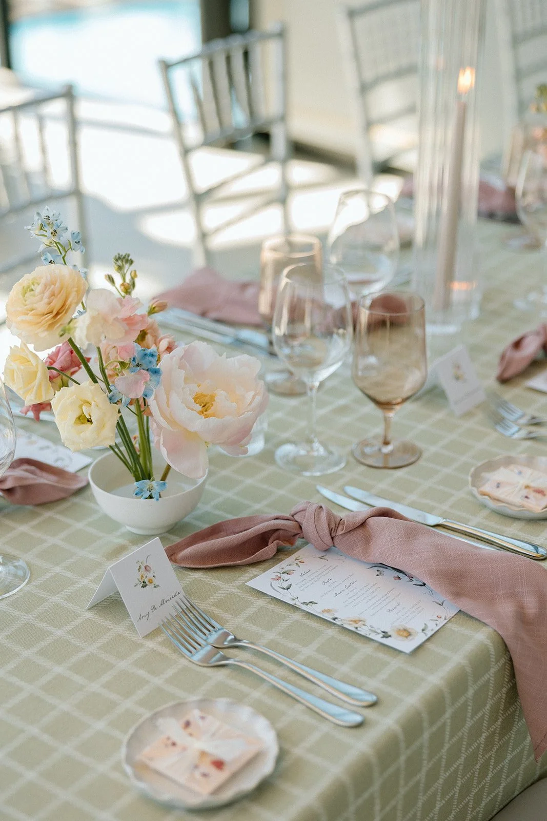  We paired the pattern with organic, dusty mauve linen napkins knotted effortlessly across custom floral-accented stationery menus. 