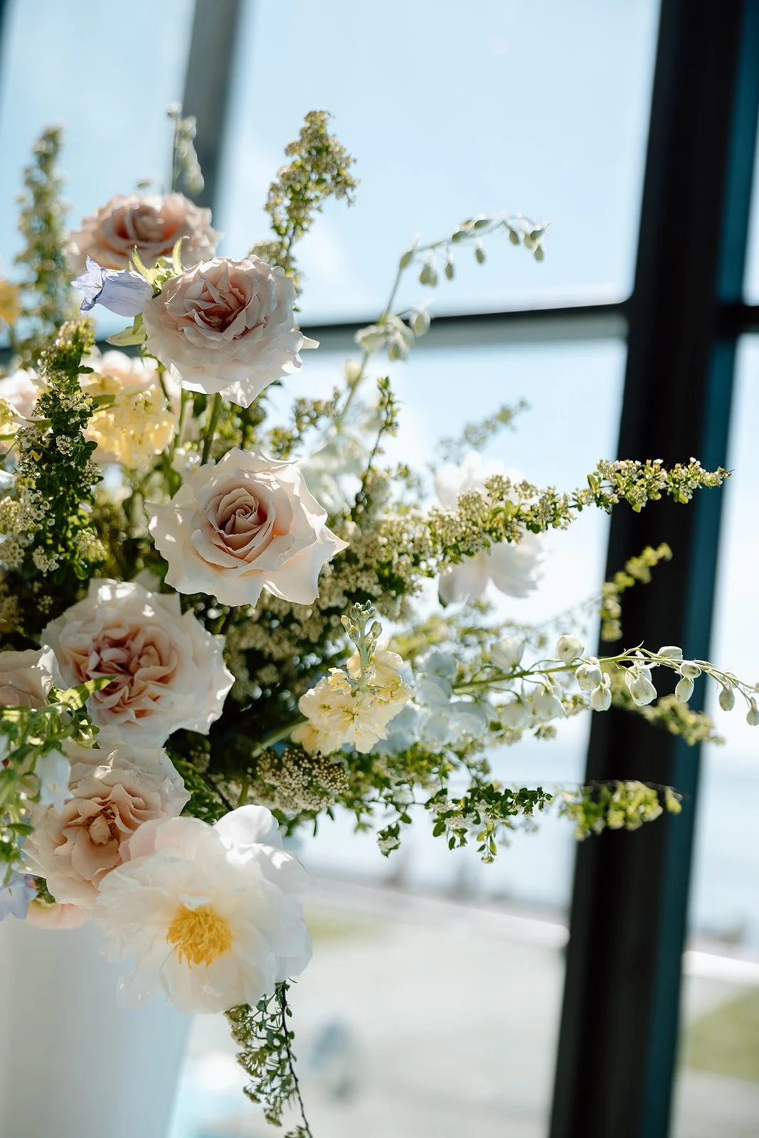  Large airy style floral urns welcome guests to the head table. 