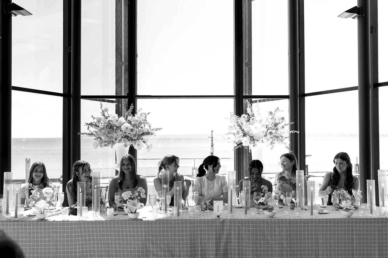  Bride enjoys her moment at the head table shared with her bridal party. 
